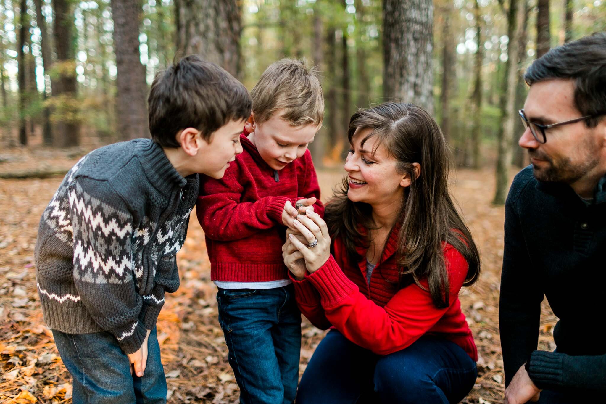 Raleigh Family Photographer | By G. Lin Photography | Family looking at toad 