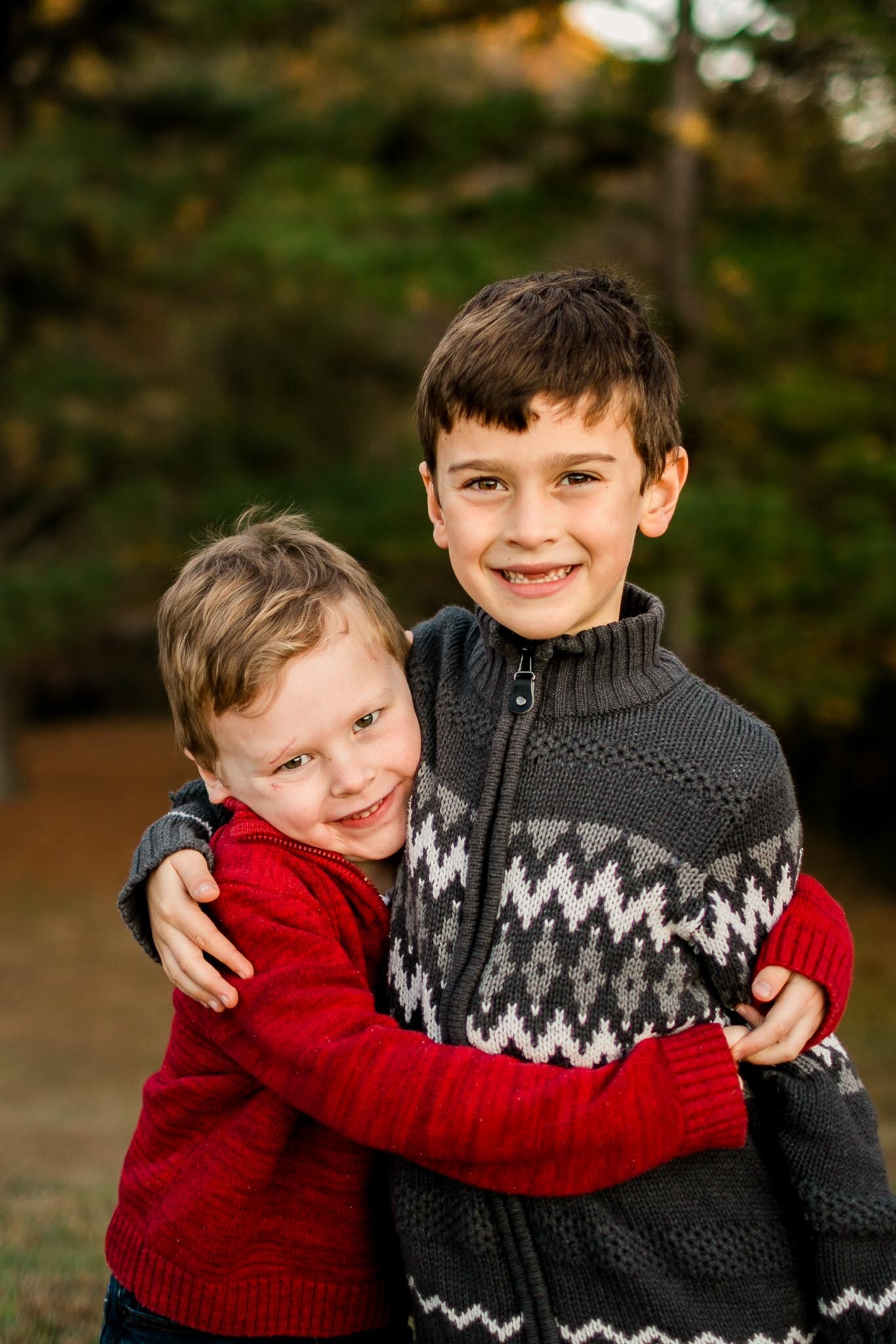 Raleigh Family Photographer | By G. Lin Photography | Two brothers hugging one another