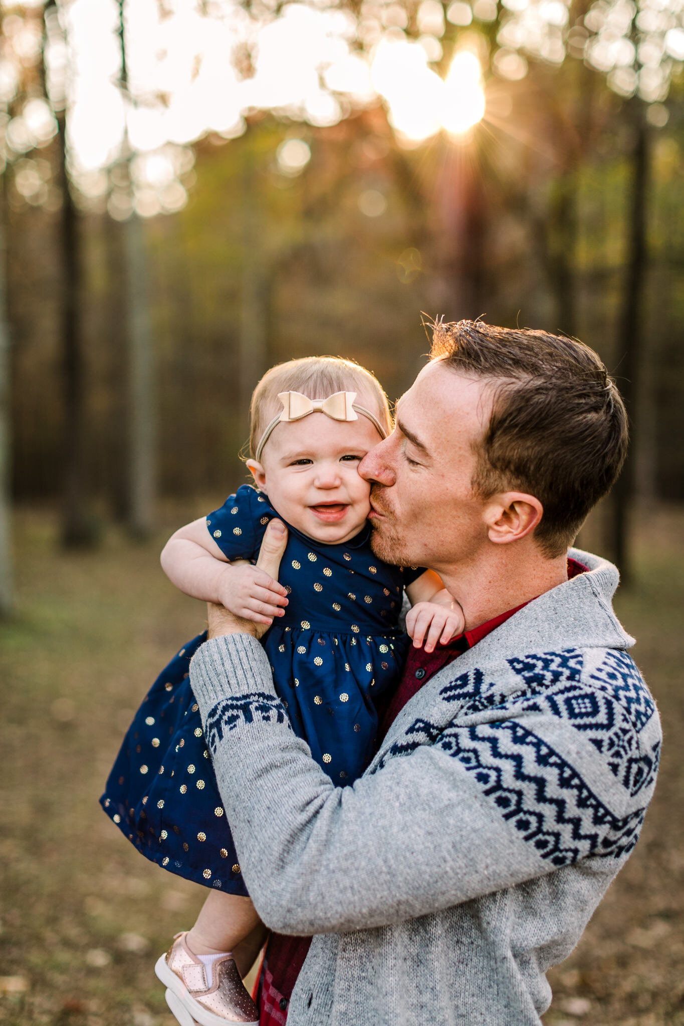 Durham Photographer | By G. Lin Photography | Dad kissing daughter on cheek | West Point on Eno River