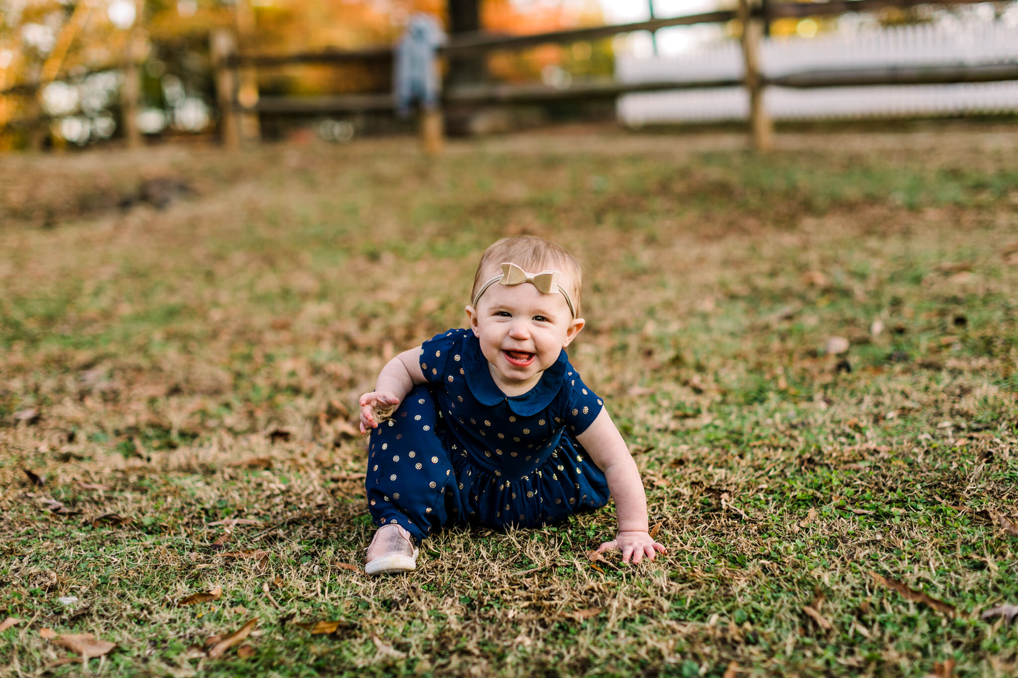 Durham Family Photographer | By G. Lin Photography | Baby girl playing on the grass | West Point on Eno River