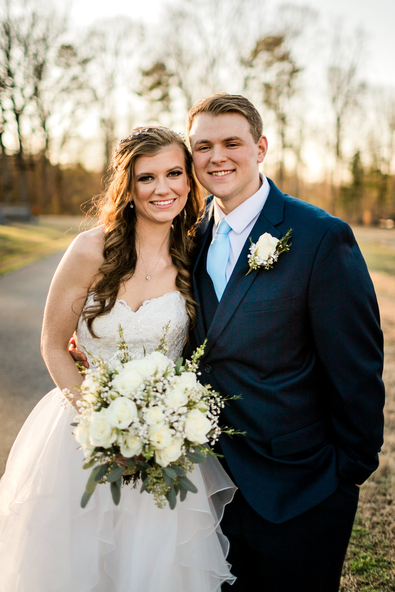 Durham Wedding Photographer | By G. Lin Photography | Bride and groom looking and smiling at camera during sunset