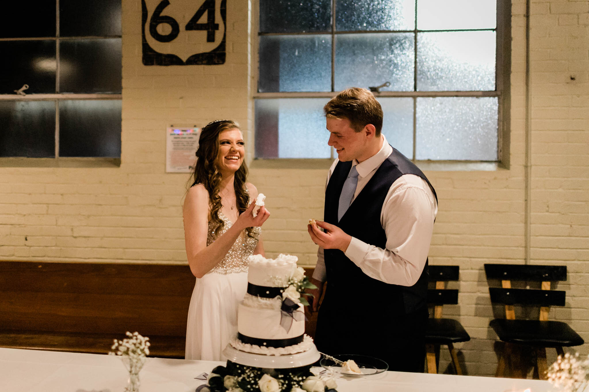 Durham Wedding Photographer | By G. Lin Photography | Bride and groom laughing next to wedding cake