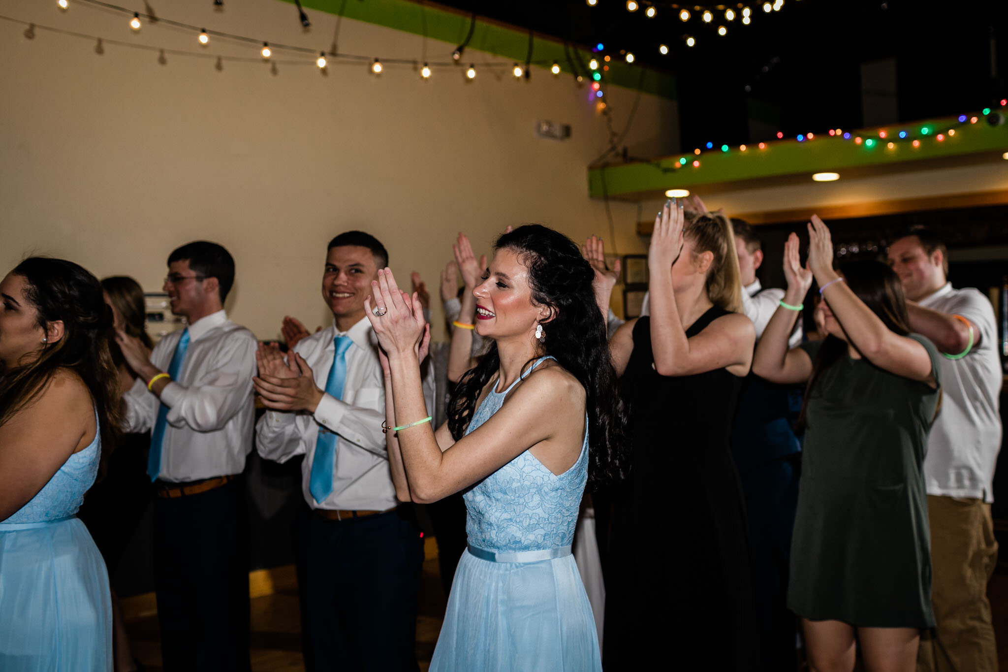 Durham Wedding Photographer | By G. Lin Photography | Woman clapping hands during dancing