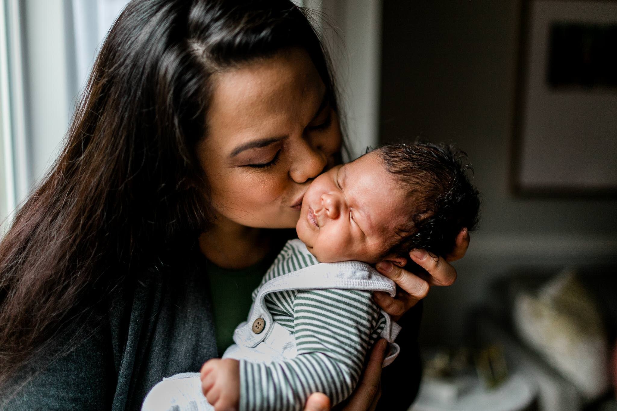 Durham Newborn Photographer | By G. Lin Photography | Mother kissing baby boy on cheek