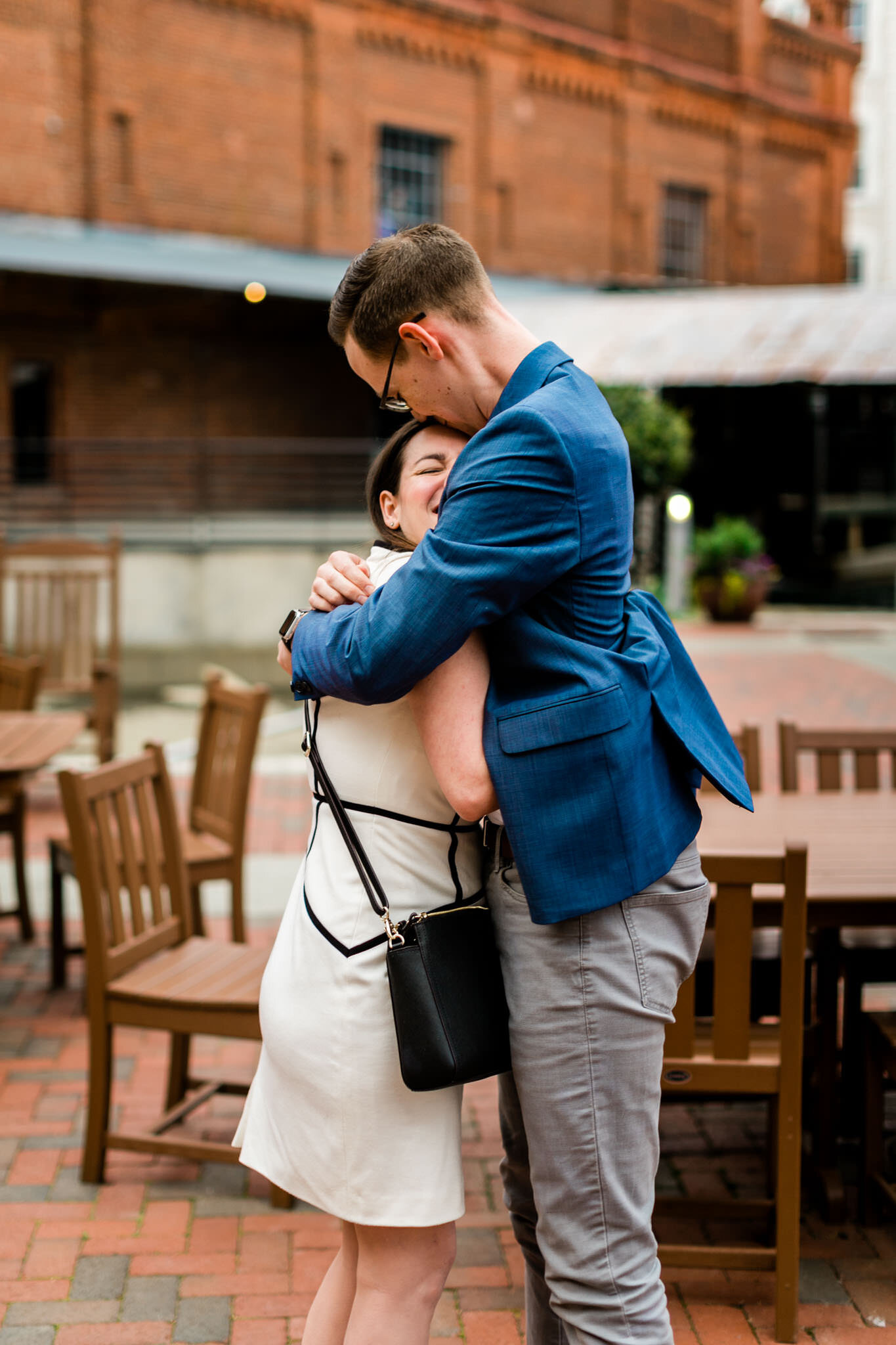 Durham Engagement Photographer | By G. Lin Photography | Man kissing fiance on the head after proposal