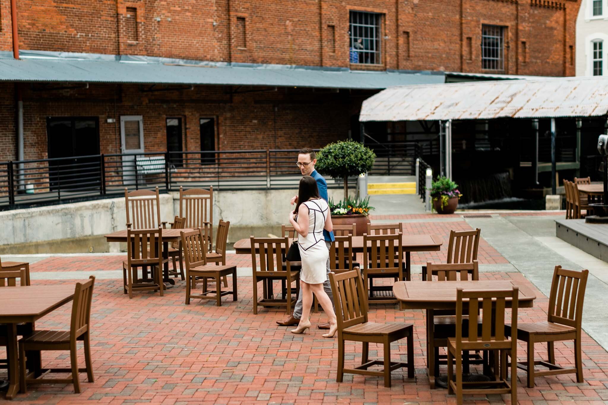 Durham Engagement Photographer | By G. Lin Photography | Couple walking at American Tobacco Campus