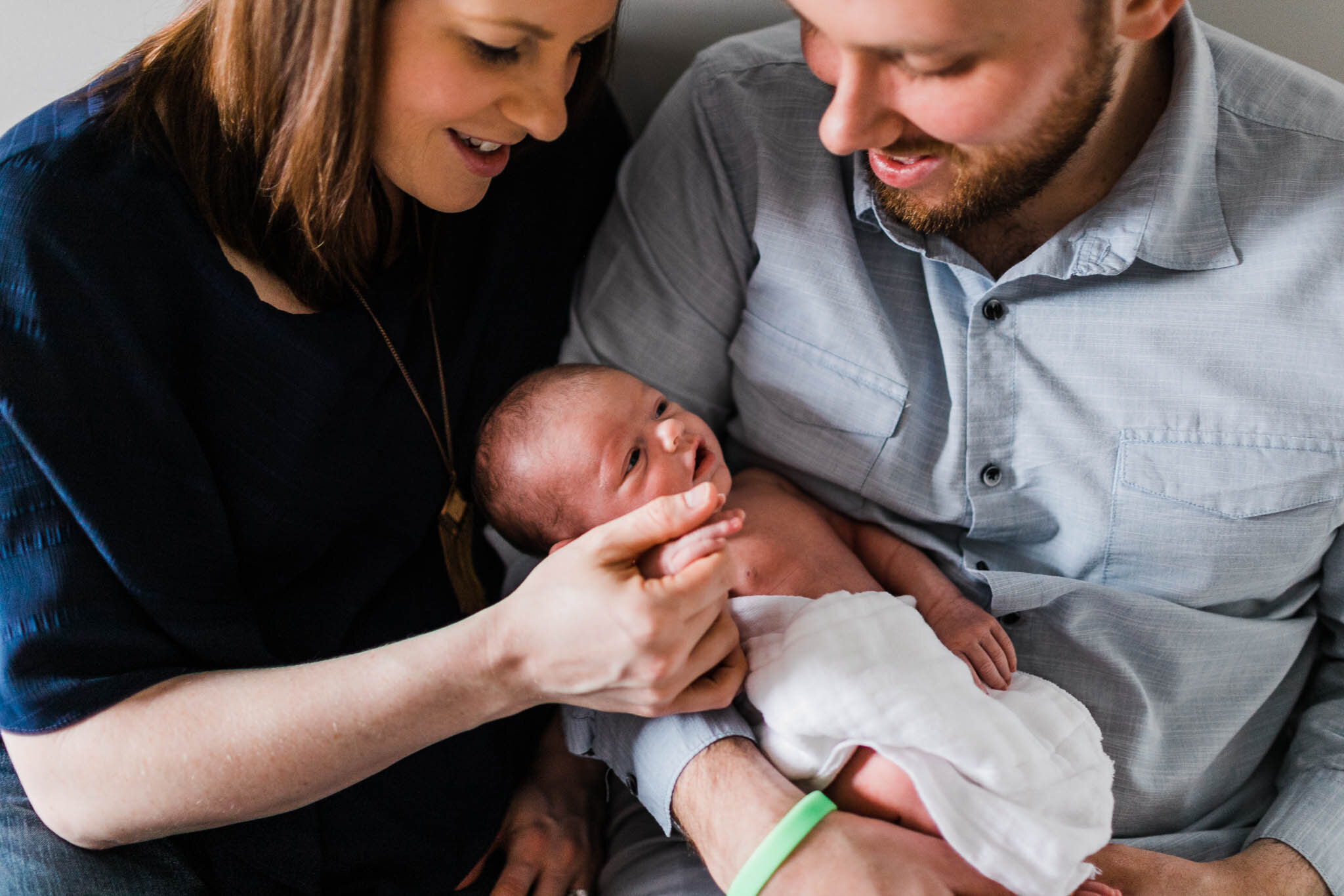 Raleigh Newborn Photographer | By G. Lin Photography | Parents holding baby's hands