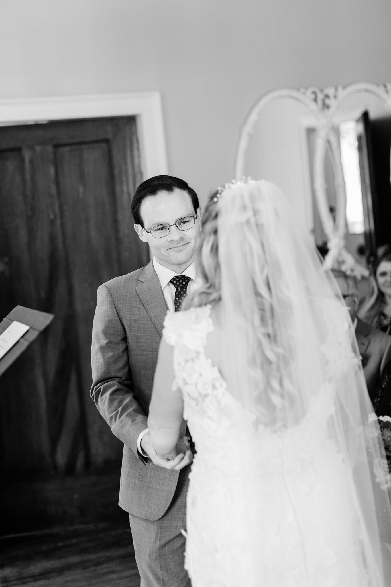 Durham Wedding Photographer | By G. Lin Photography | Black and white candid photo of groom looking at bride