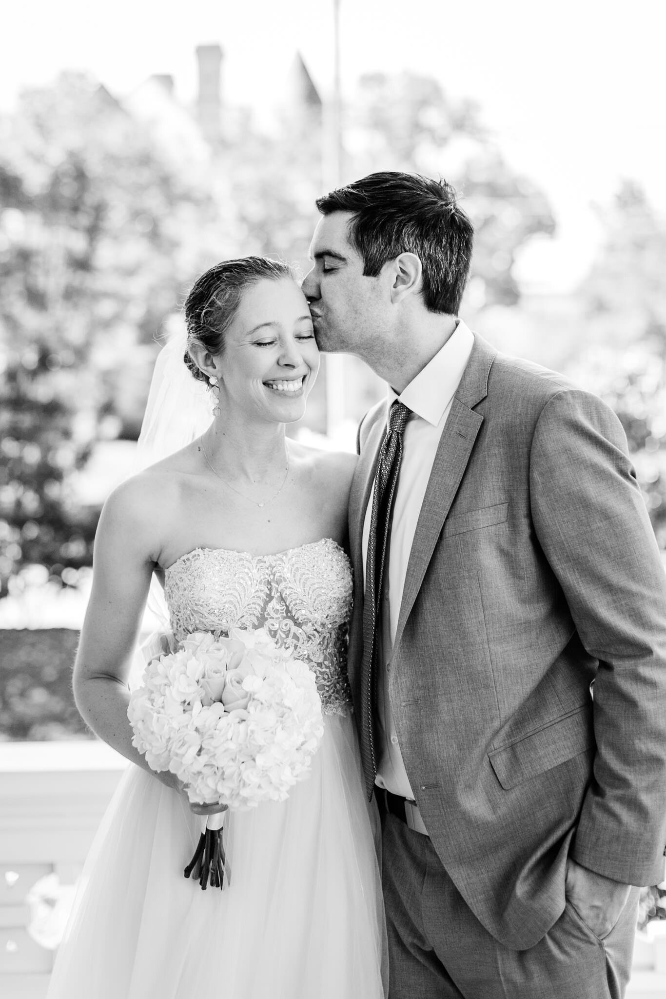 Raleigh Wedding Photographer | By G. Lin Photography | Merrimon Wynne House | Groom kissing bride on cheek