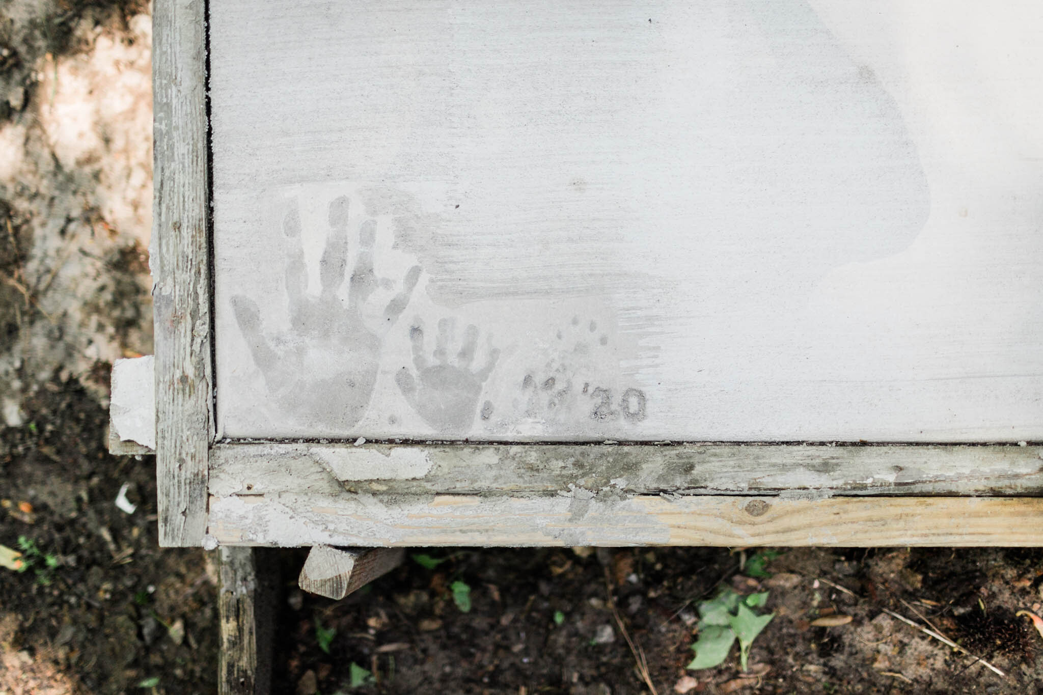 Raleigh Family Photographer | By G. Lin Photography | Handprints on cement