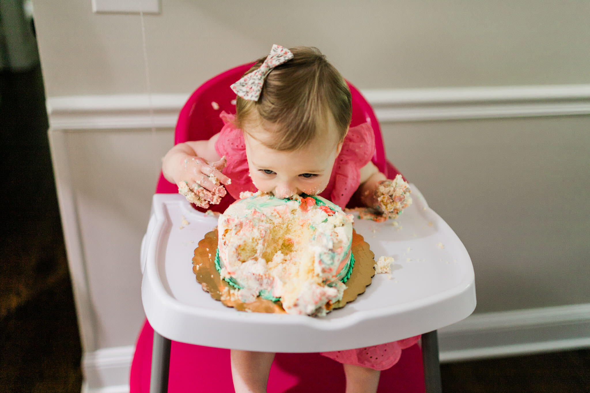 Raleigh Family Photographer | By G. Lin Photography | Baby girl putting face into cake