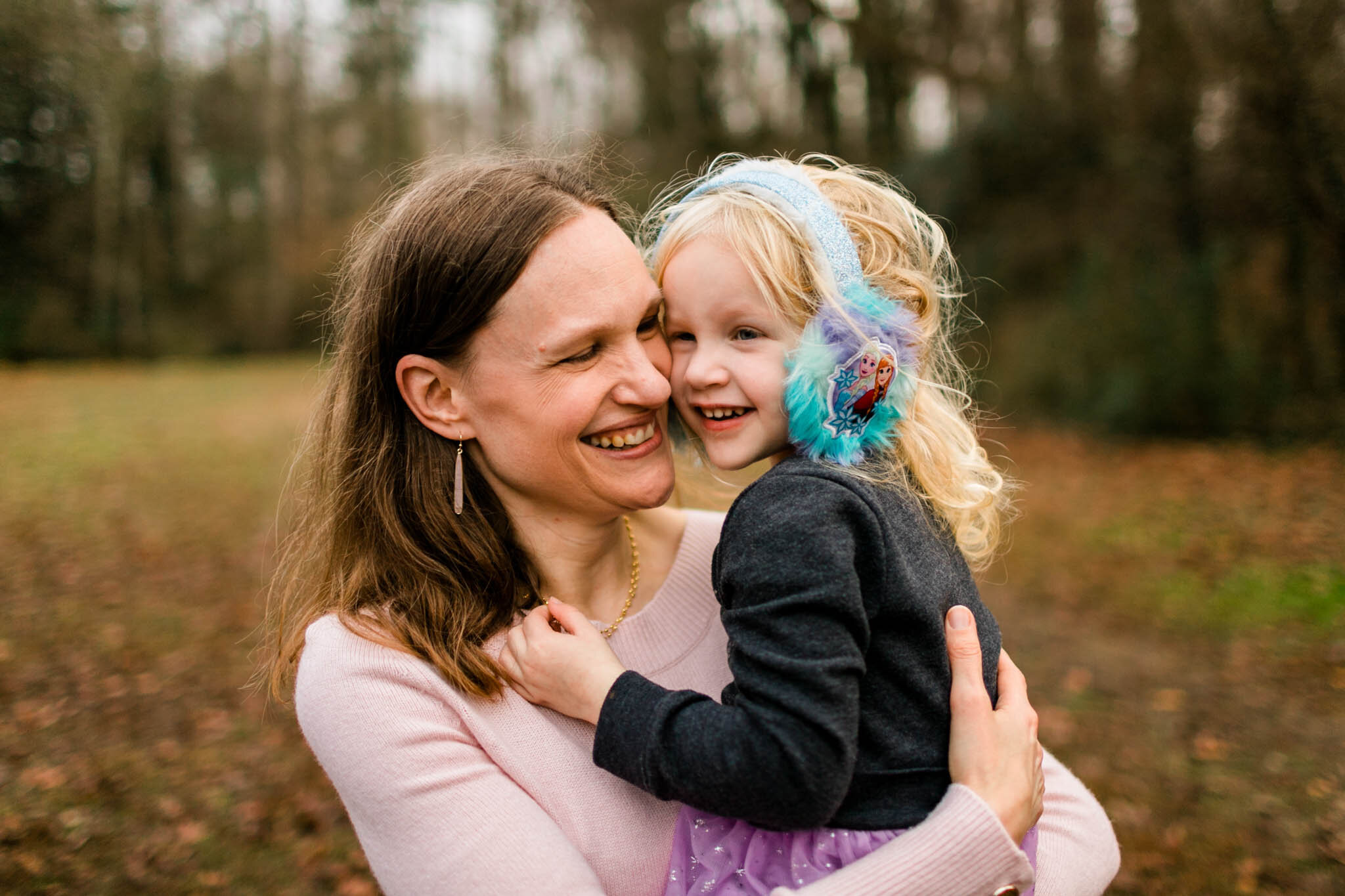 Durham Family Photographer | By G. Lin Photography | Mother and young daughter in her arms