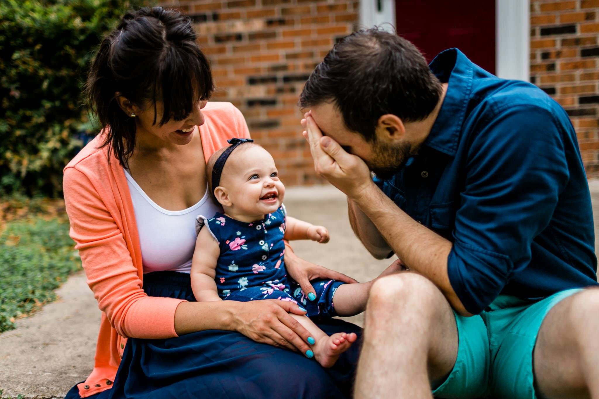 Raleigh Family Photographer | By G. Lin Photography | Parents playing peekaboo with baby girl