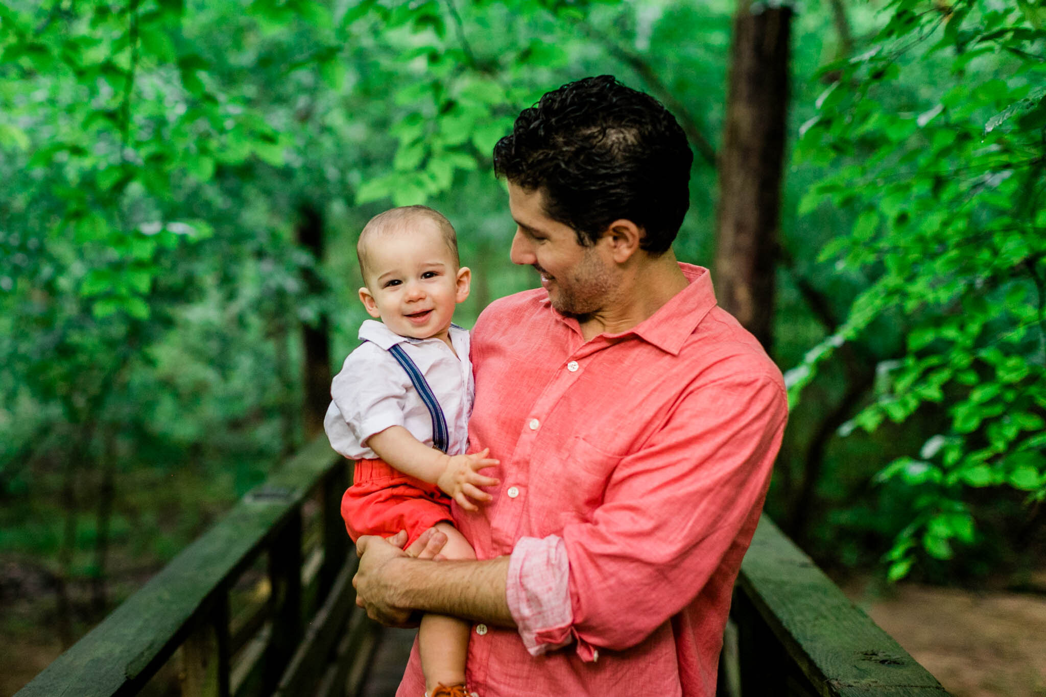Raleigh Family Photographer | By G. Lin Photography | Father holding baby boy in arms