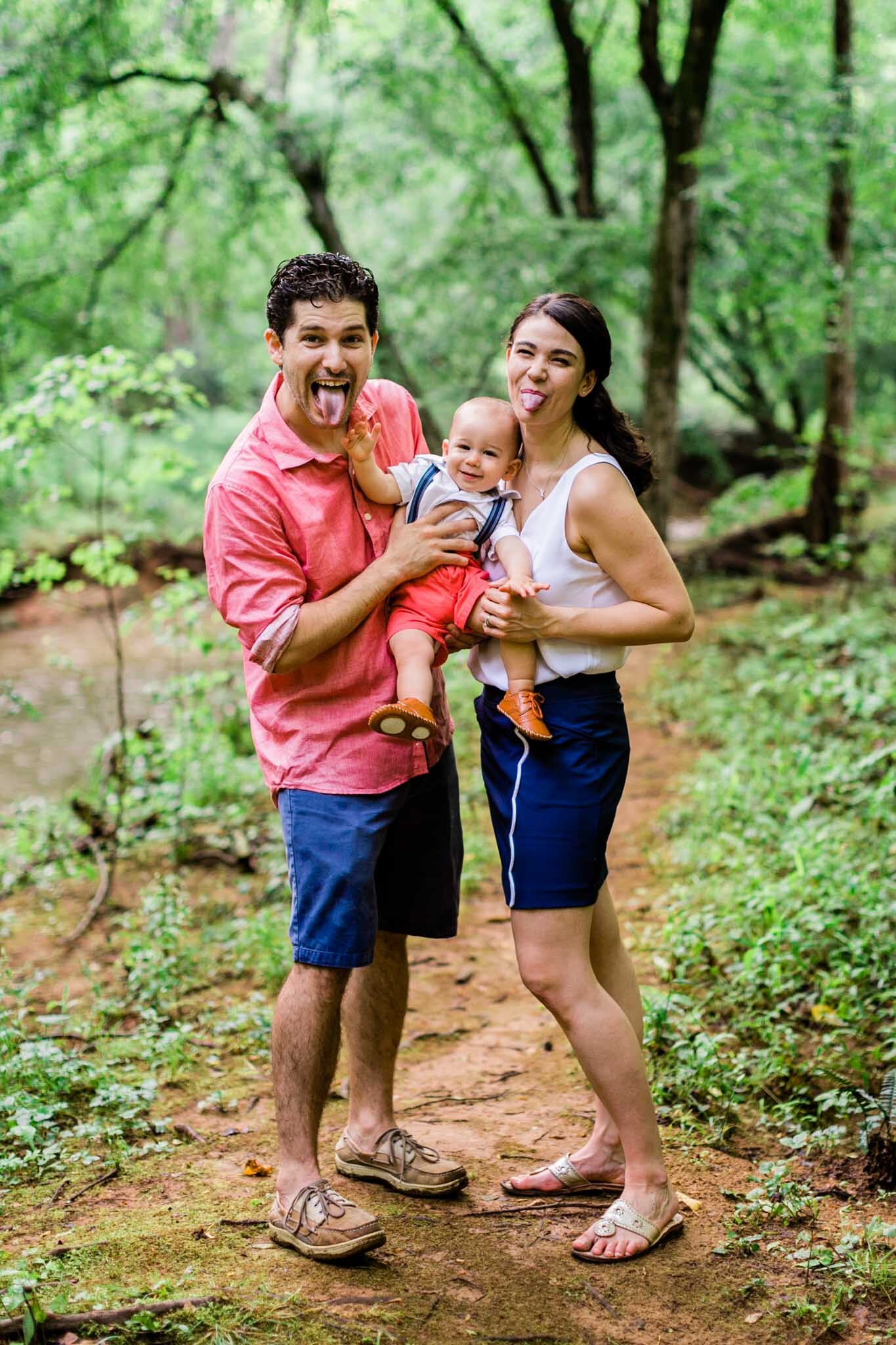 Raleigh Family Photographer | By G. Lin Photography | Family photo with parents sticking out tongues