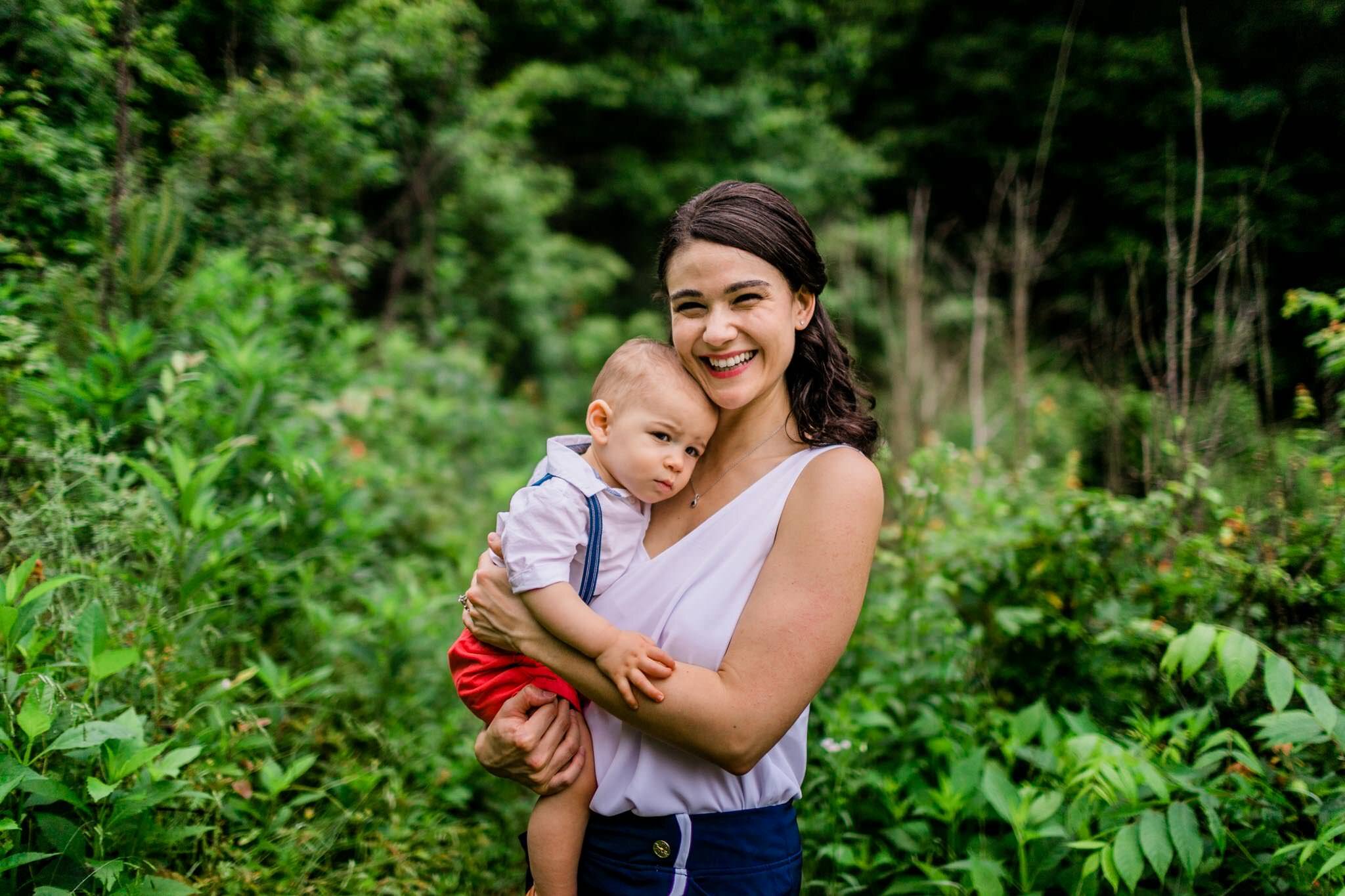 Raleigh Family Photographer | By G. Lin Photography | Mother holding sleepy baby in arms