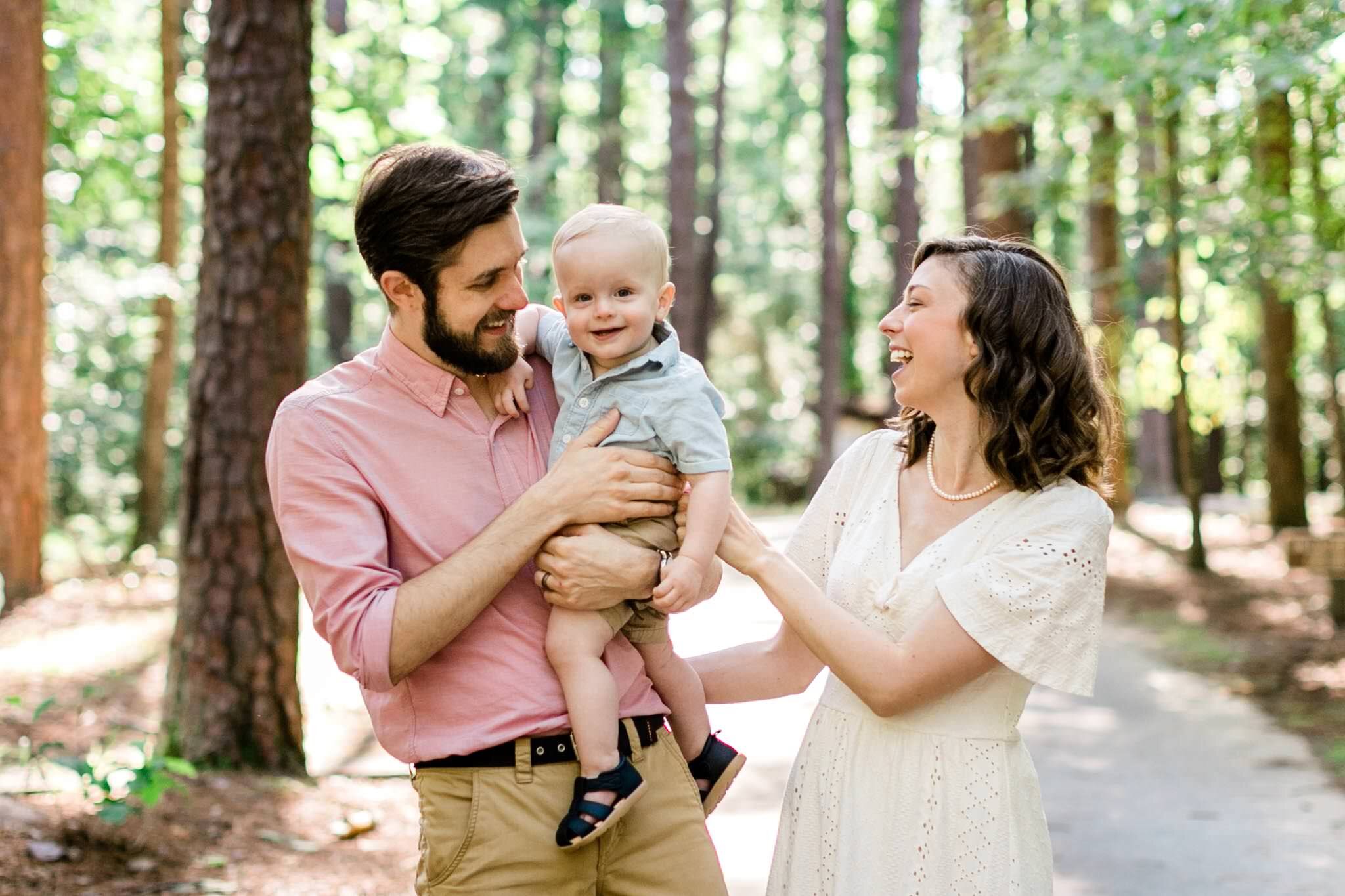 Raleigh Family Photographer | By G. Lin Photography | Umstead Park | Candid outdoor family photo in natural setting