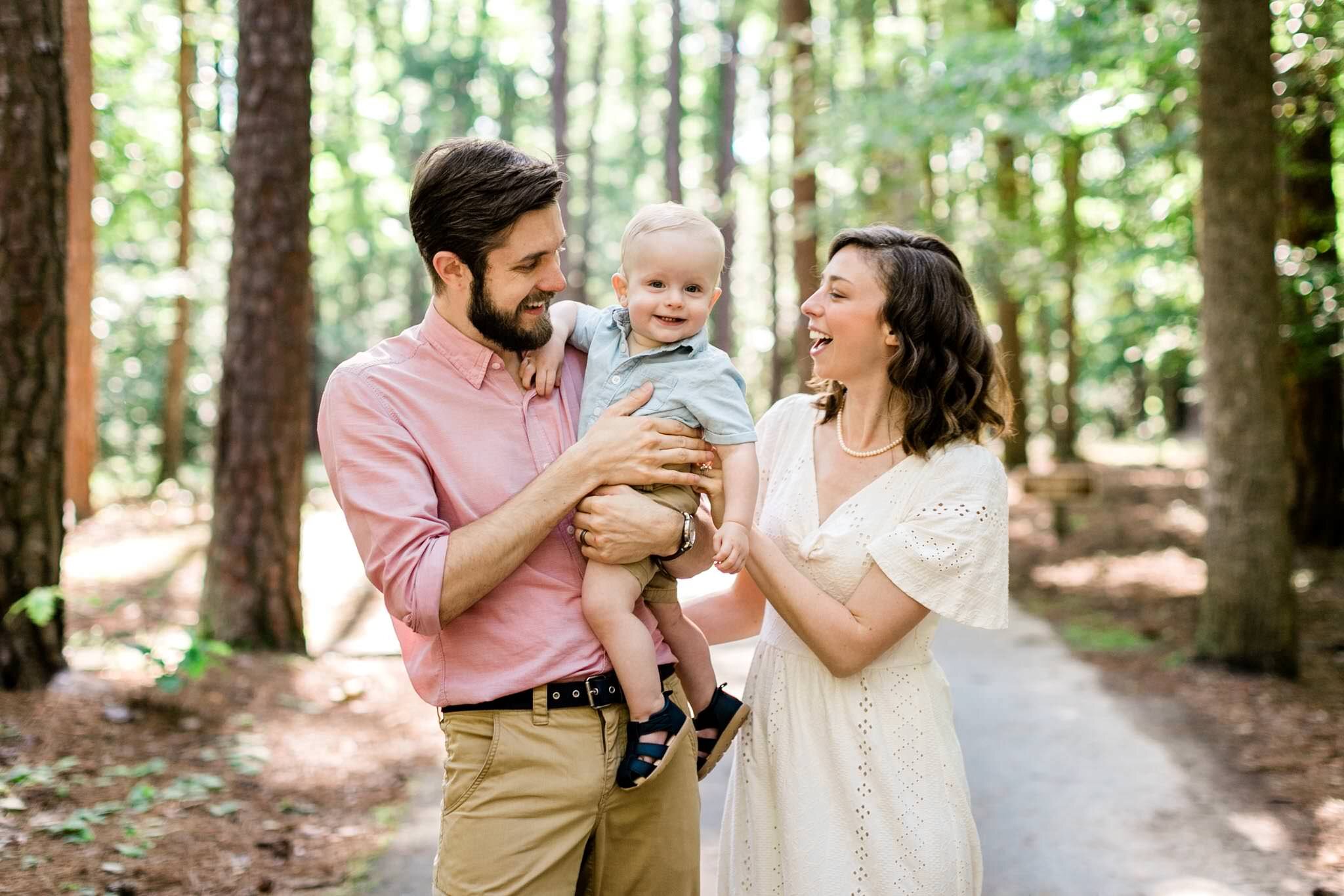 Raleigh Family Photographer | By G. Lin Photography | Umstead Park | Candid family photo outdoors