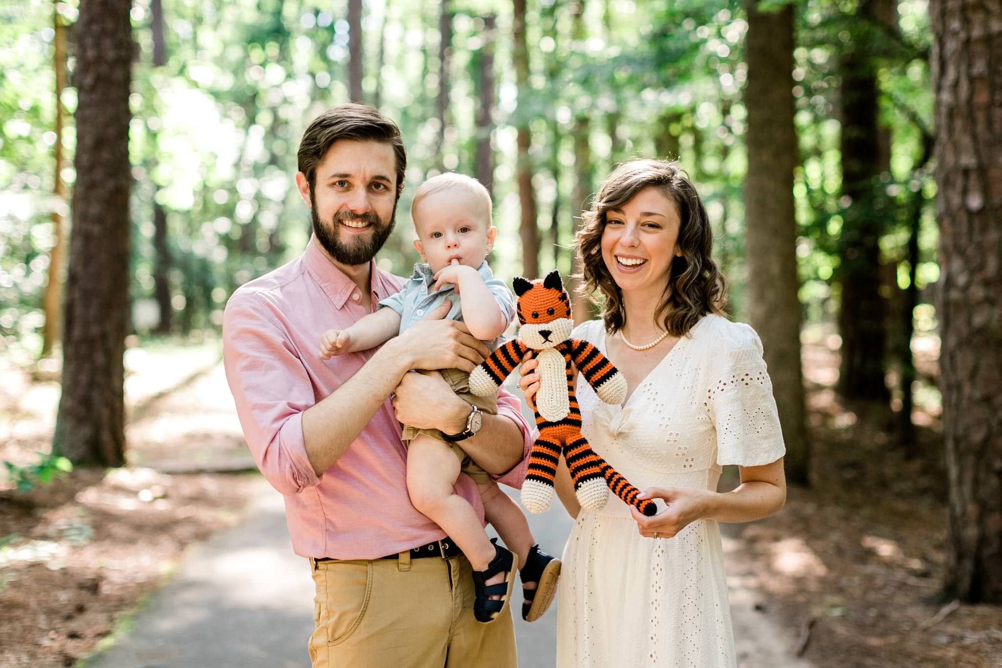 Raleigh Family Photographer | By G. Lin Photography | Umstead Park | Outdoor family photo with stuffed animal