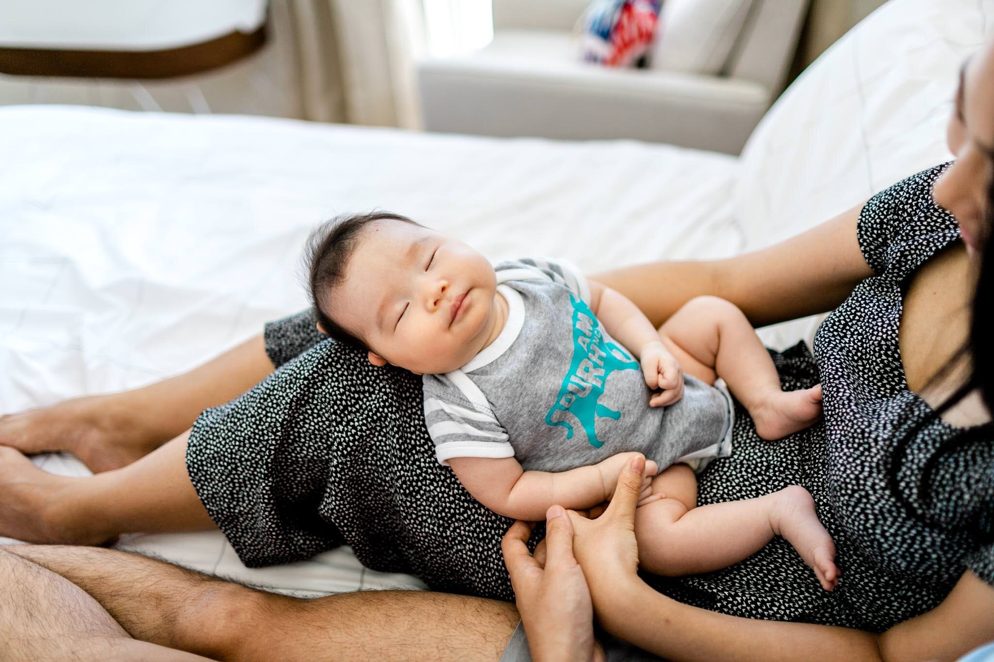 Raleigh Newborn Photographer | By G. Lin Photography | Baby girl sleeping on mom's lap