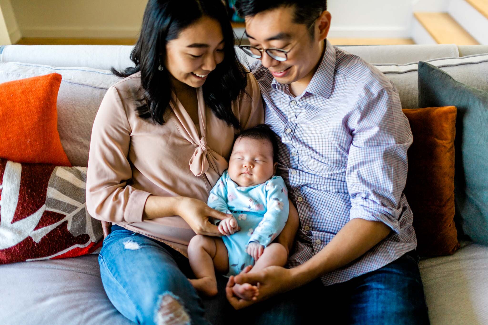 Raleigh Newborn Photographer | By G. Lin Photography | Lifestyle newborn session at home with parents on the couch