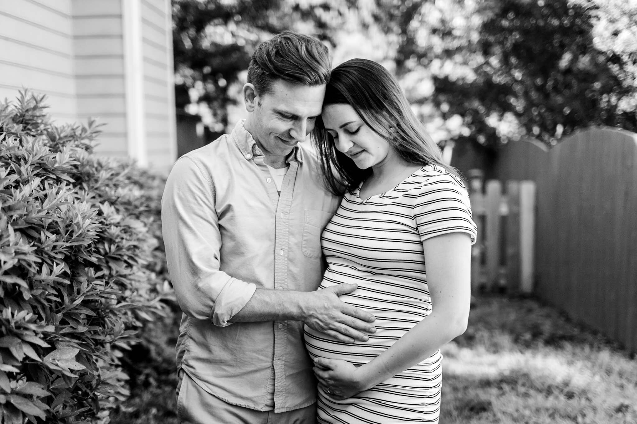 Durham Maternity Photographer | By G. Lin Photography | Black and white maternity photo of couple touching mother's belly
