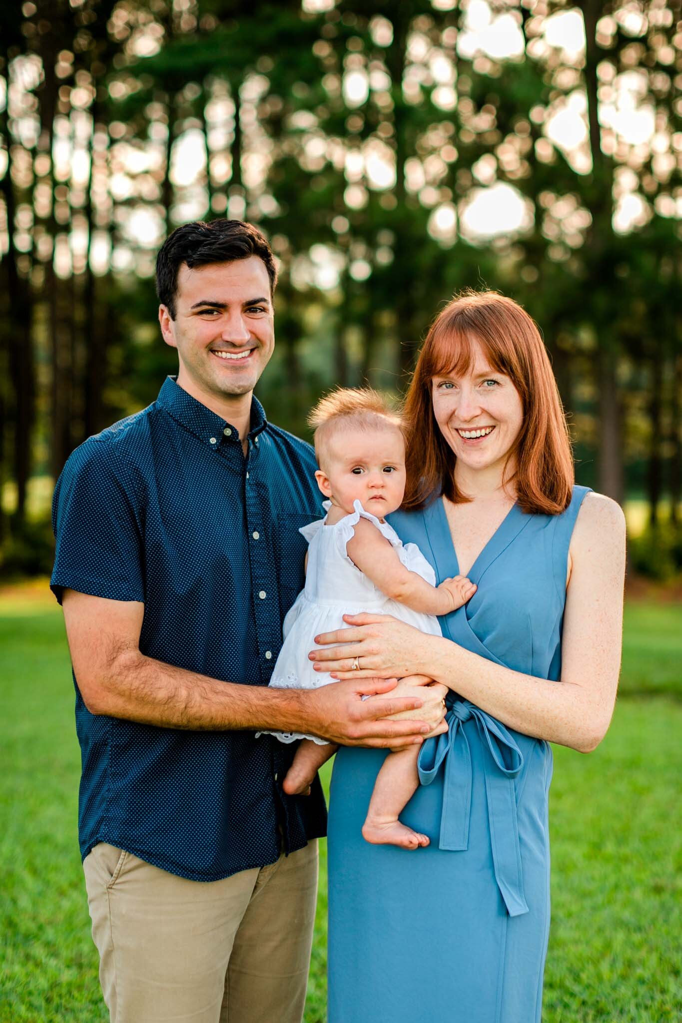 Raleigh Family Photographer | By G. Lin Photography | Dix Park | Portrait outdoors of family of three looking at camera