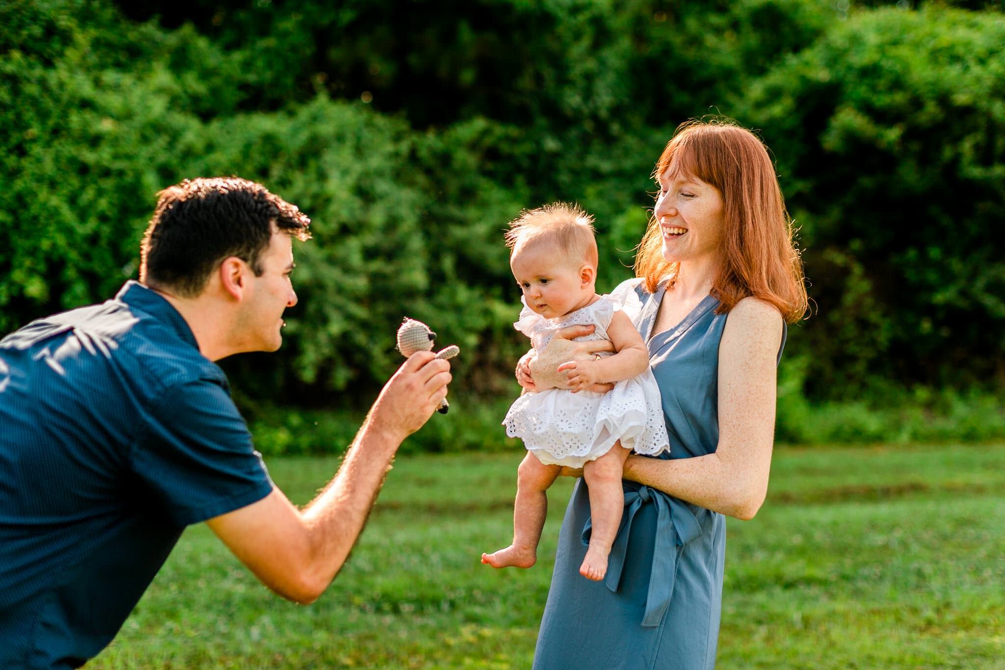 Raleigh Family Photographer | By G. Lin Photography | Dix Park | Dad playing with baby girl