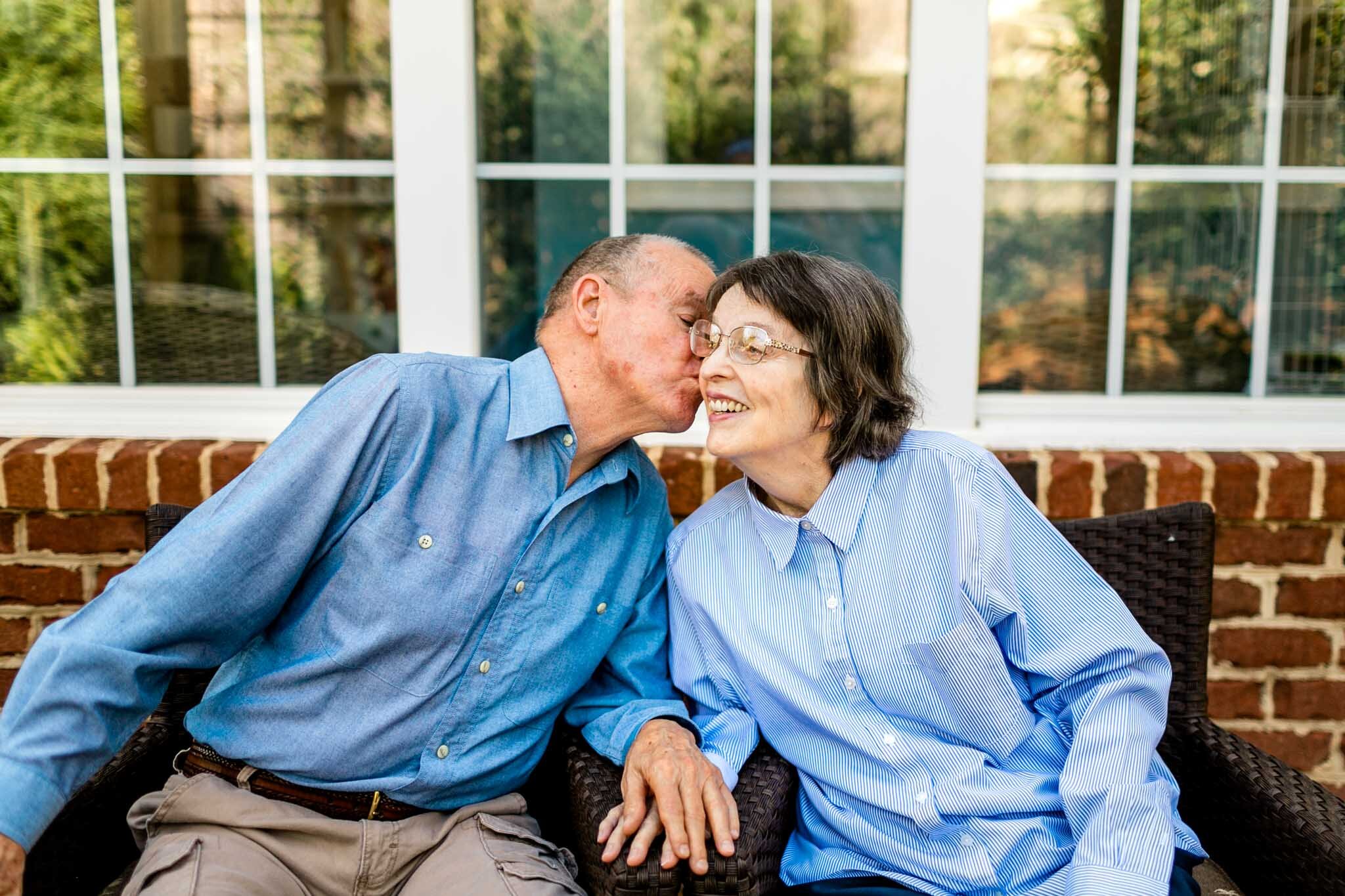 Raleigh Family Photographer | By G. Lin Photography | Husband kissing wife on cheek