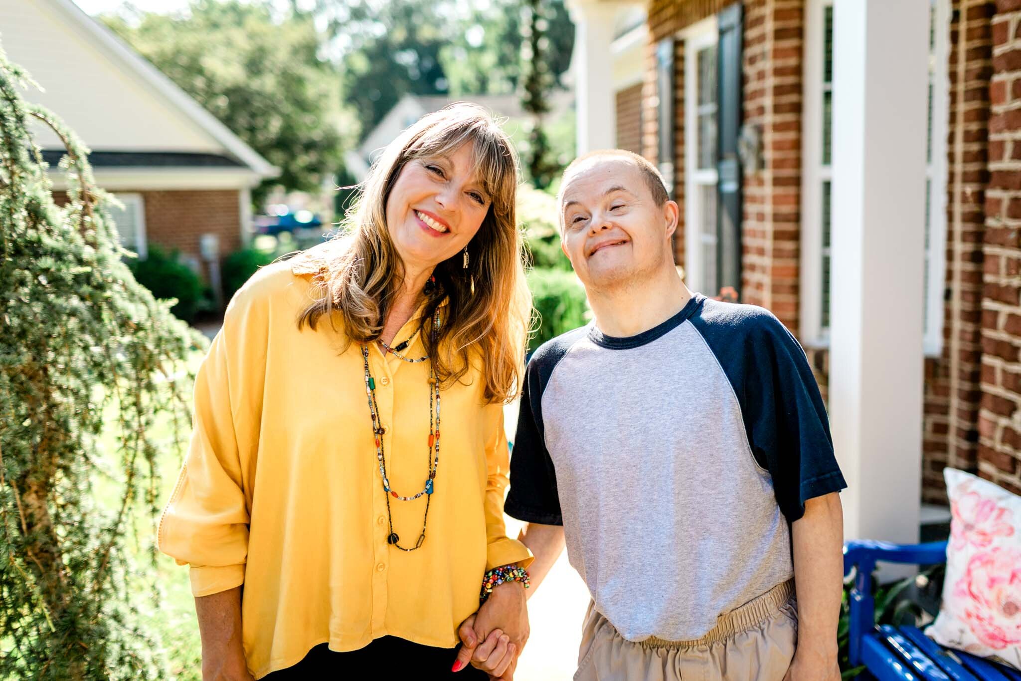 Raleigh Family Photographer | By G. Lin Photography | Outdoor sibling shot of woman and man with down syndrome