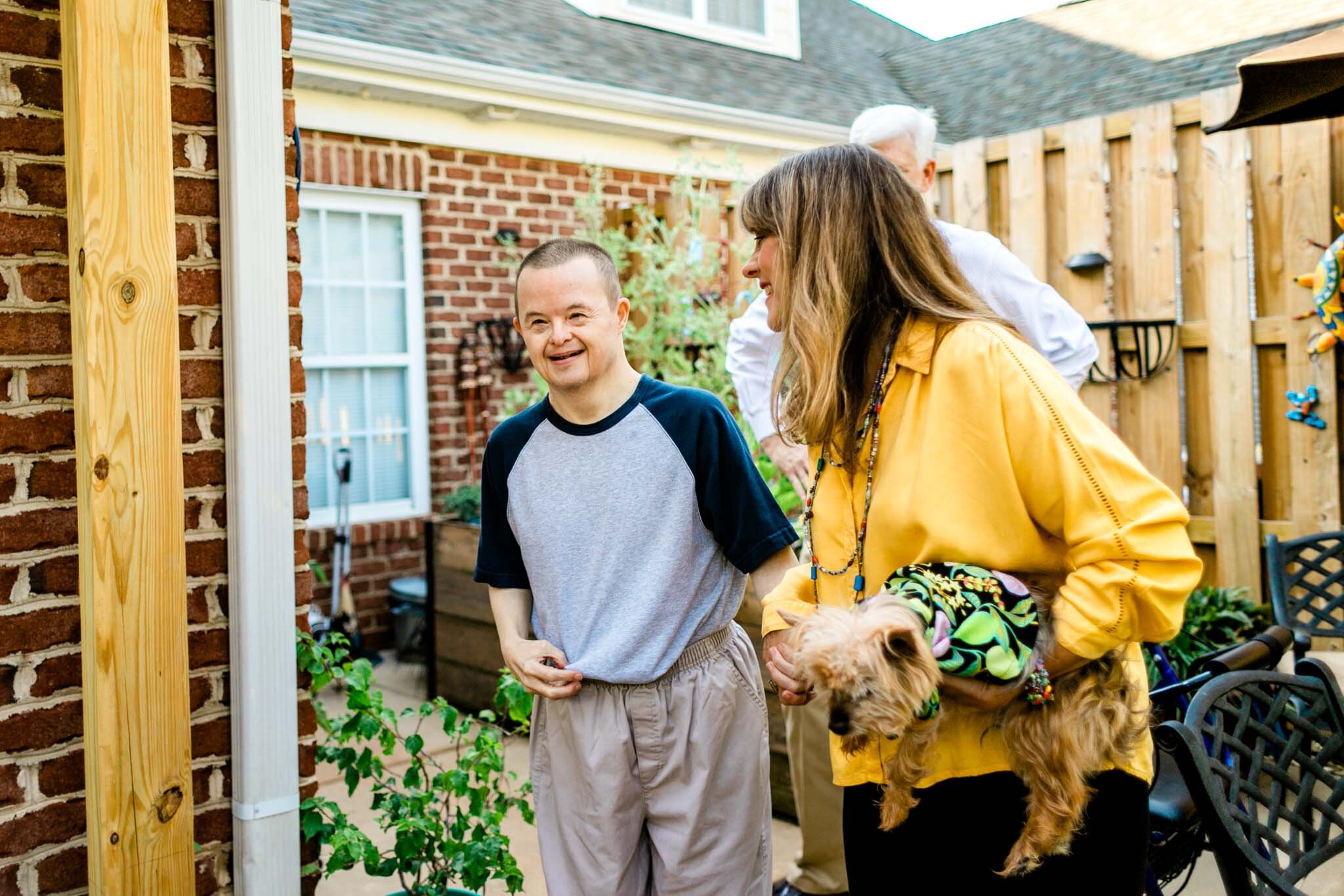 Raleigh Family Photographer | By G. Lin Photography | Man with down syndrome laughing and smiling