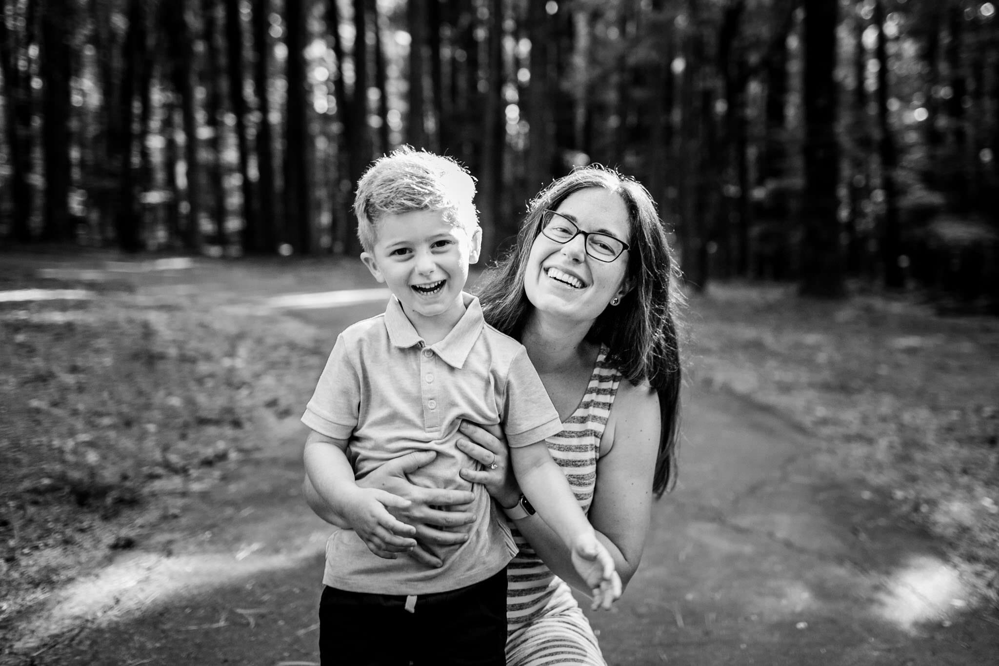Raleigh Family Photographer | Umstead Park | By G. Lin Photography | Mom and son laughing together outside