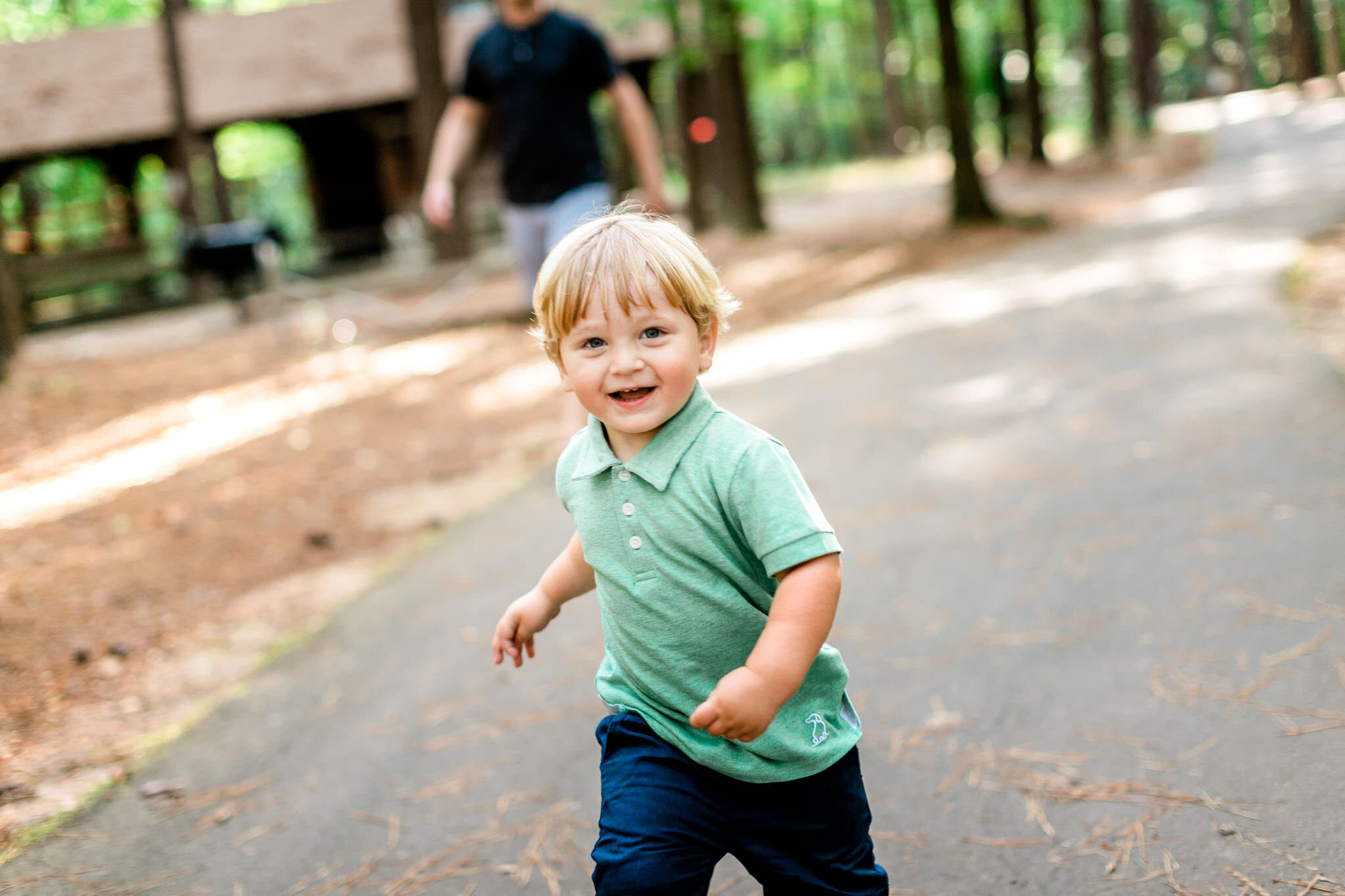 Raleigh Family Photographer | Umstead Park | By G. Lin Photography | Toddler boy running outside