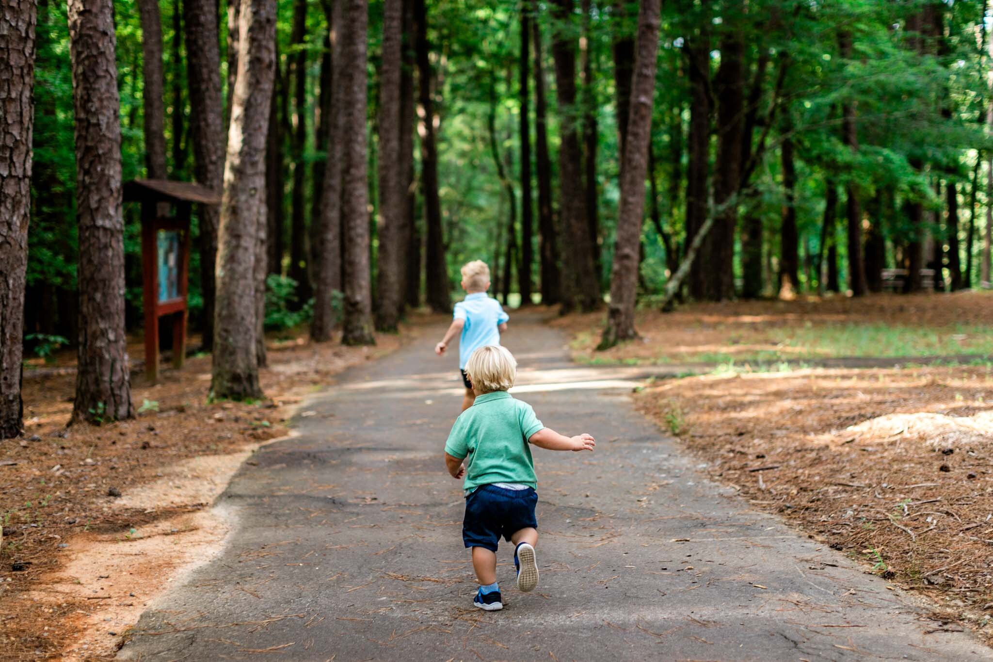 Raleigh Family Photographer | Umstead Park | By G. Lin Photography | Young boys running outside
