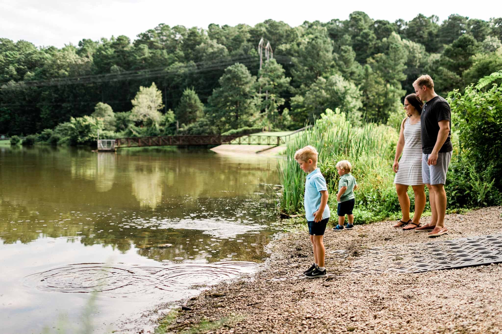 Raleigh Family Photographer | Umstead Park | By G. Lin Photography | Family standing by lake