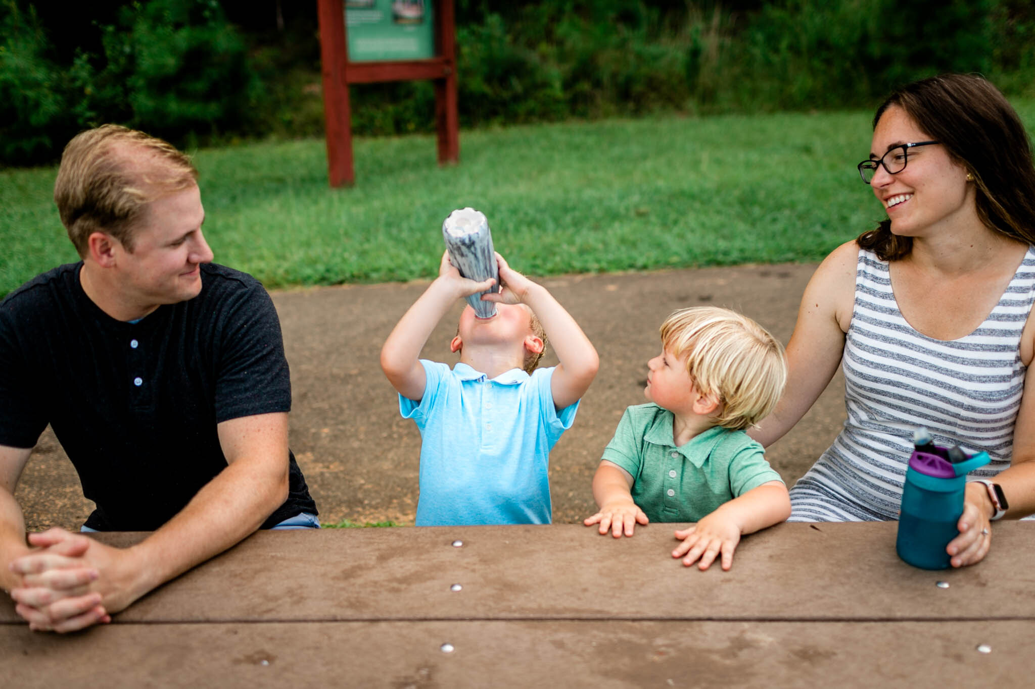 Raleigh Family Photographer | Umstead Park | By G. Lin Photography | Boy drinking from water bottle