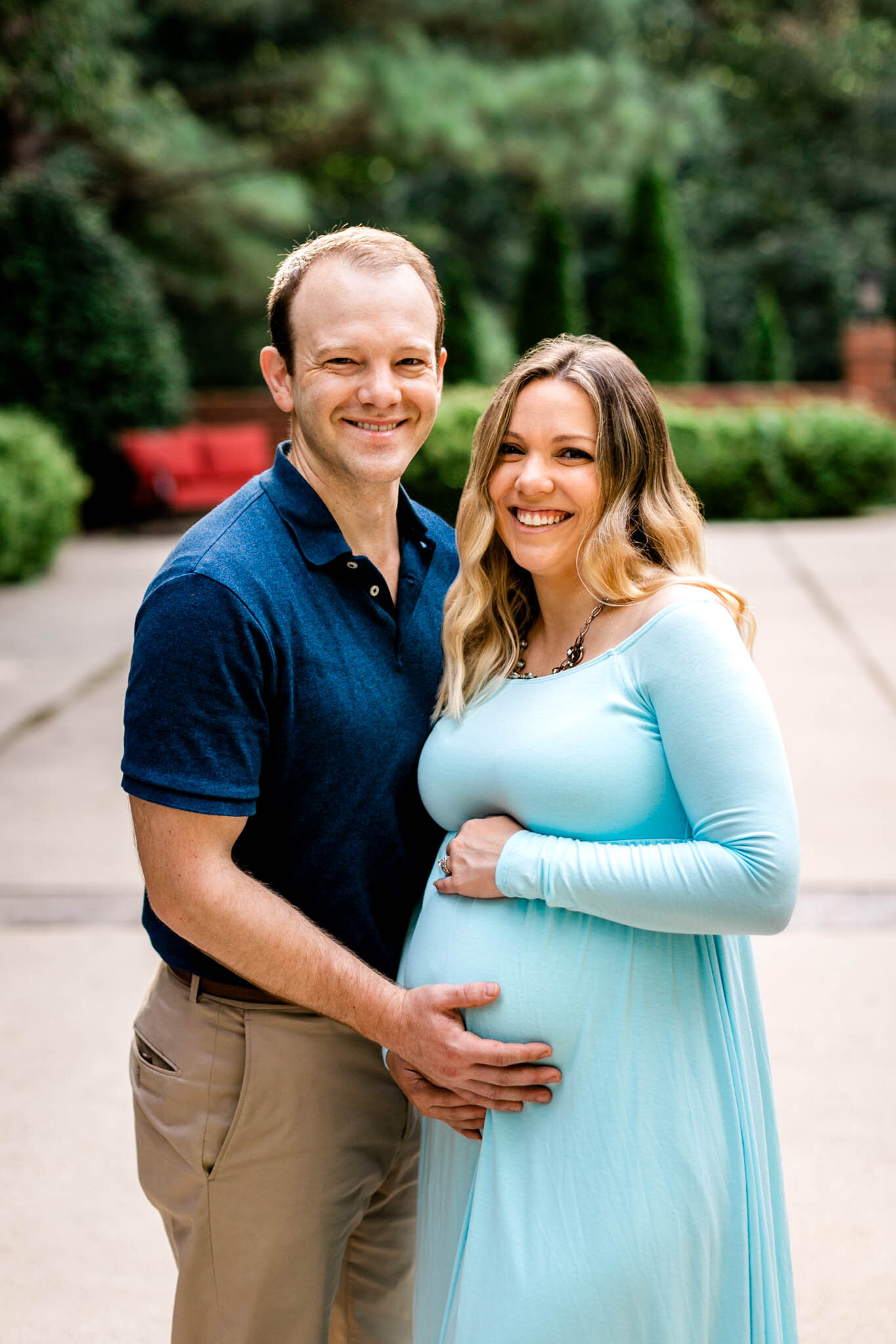 Raleigh Maternity Photographer | By G. Lin Photography | Couple smiling at camera outside