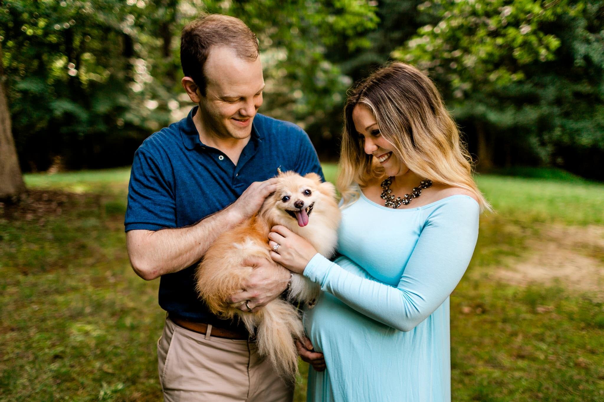 Raleigh Maternity Photographer | By G. Lin Photography | Couple holding and looking at dog