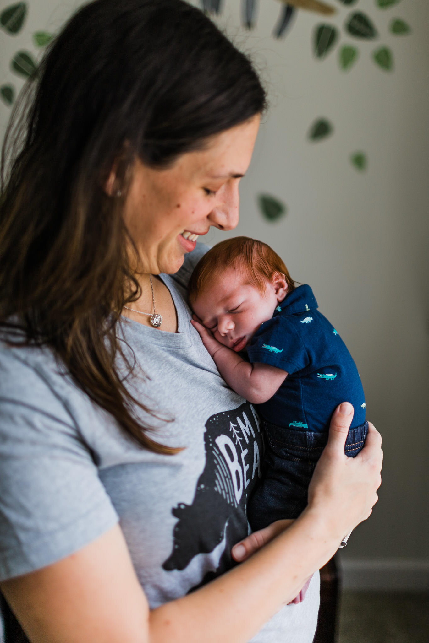 Raleigh Newborn Photographer | By G. Lin Photography | Mother holding newborn baby boy