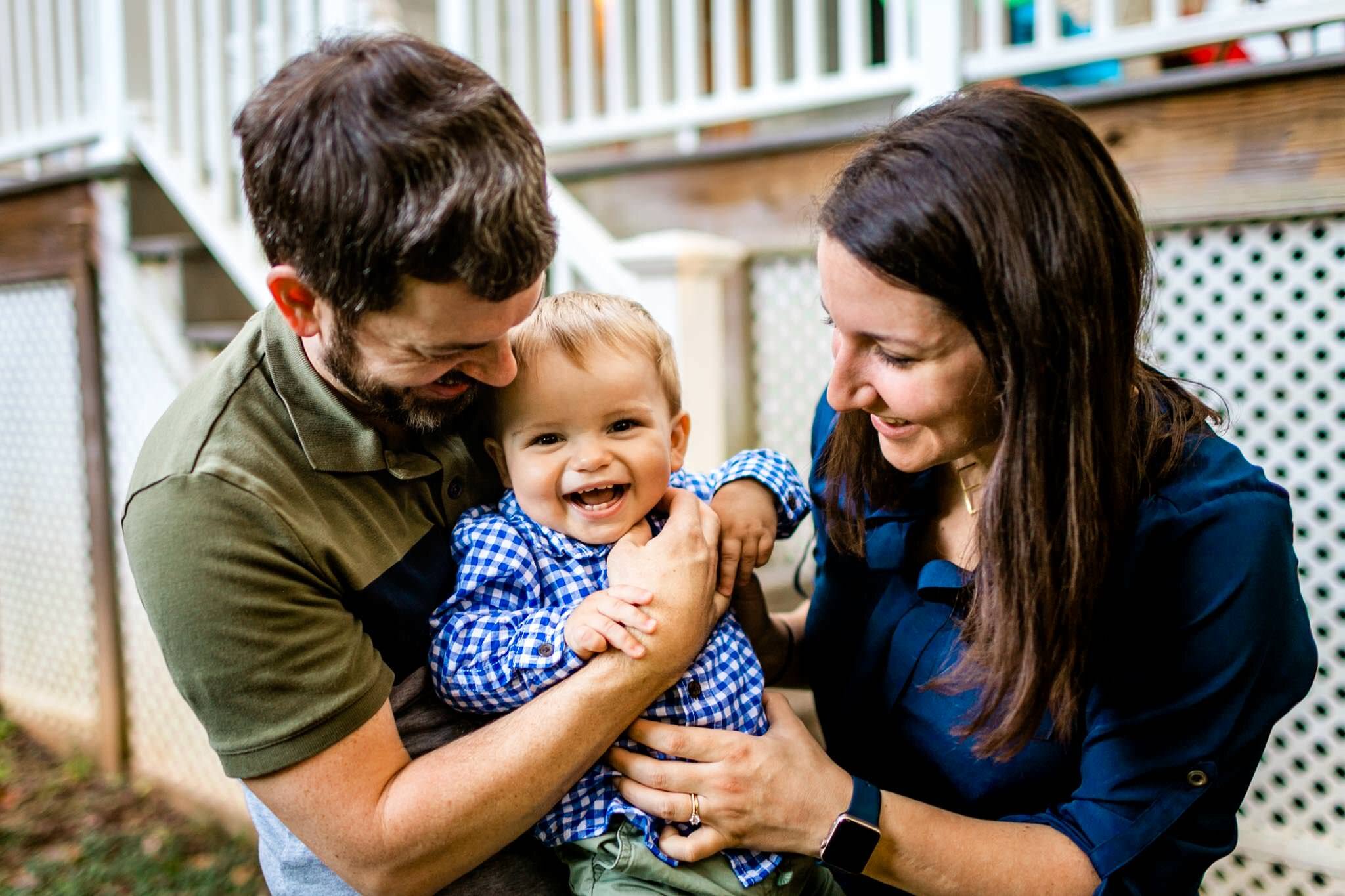 Raleigh Family Photographer | By G. Lin Photography | Baby smiling while parents tickling him