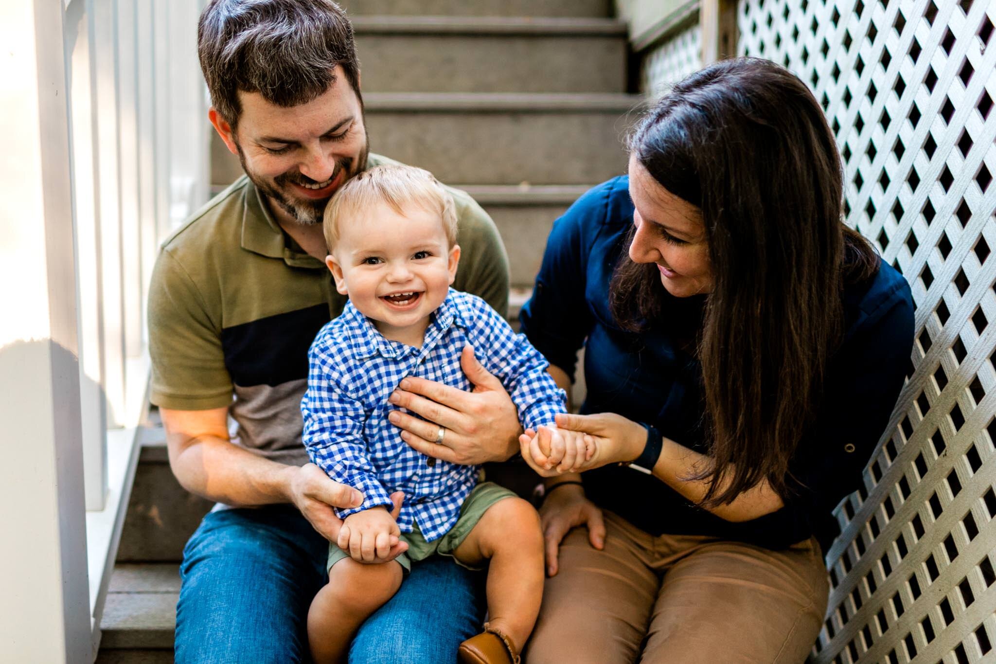 Raleigh Family Photographer | By G. Lin Photography | Family with baby boy sitting on steps outside