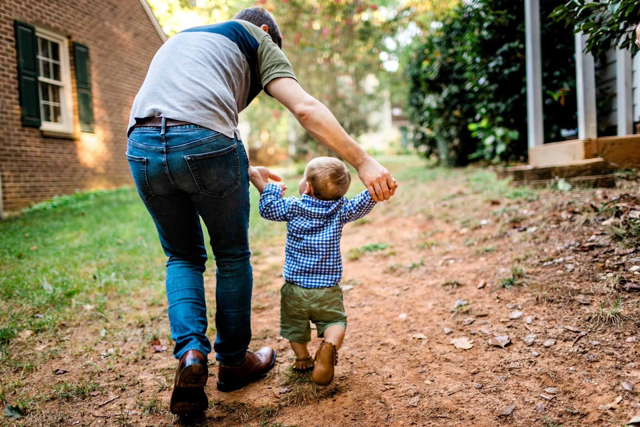 Raleigh Family Photographer | By G. Lin Photography | Father helping baby boy walk