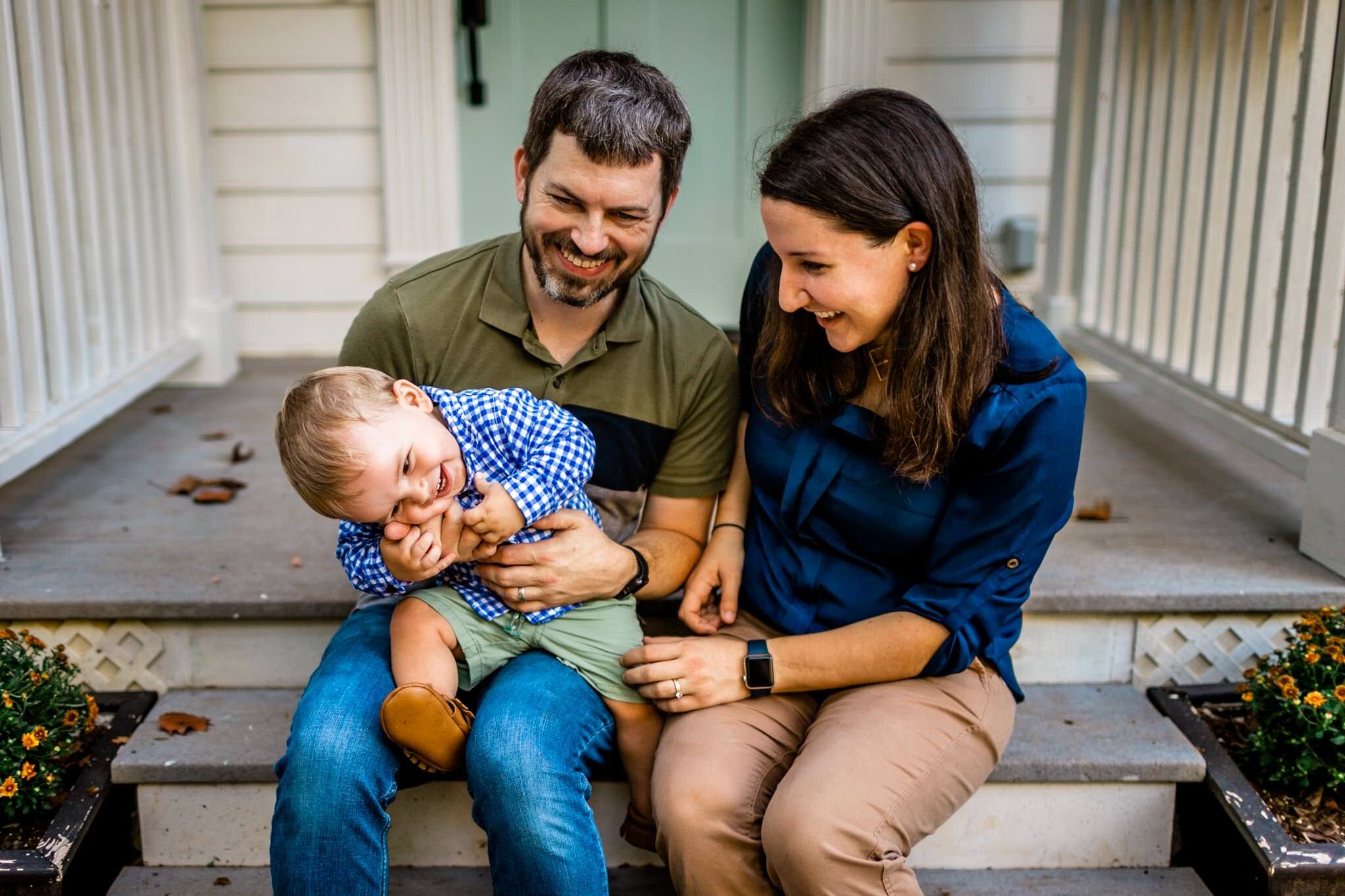 Raleigh Family Photographer | By G. Lin Photography | Family laughing together on front porch