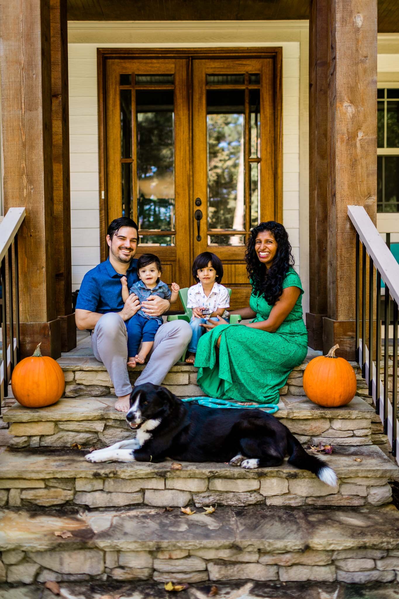 Durham Family Photographer | By G. Lin Photography | Family sitting together on steps of front porch