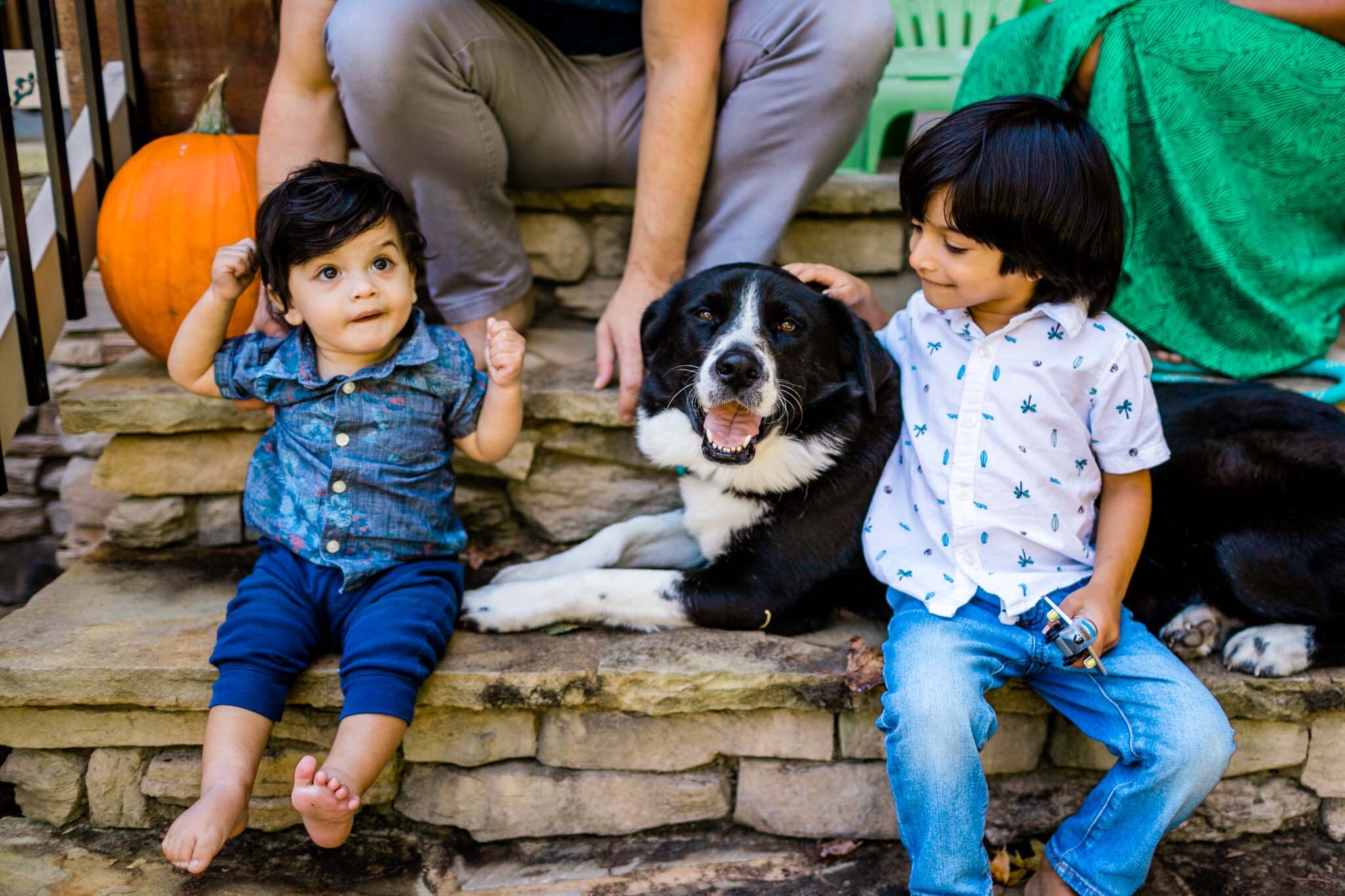 Durham Family Photographer | By G. Lin Photography | Young children petting dog