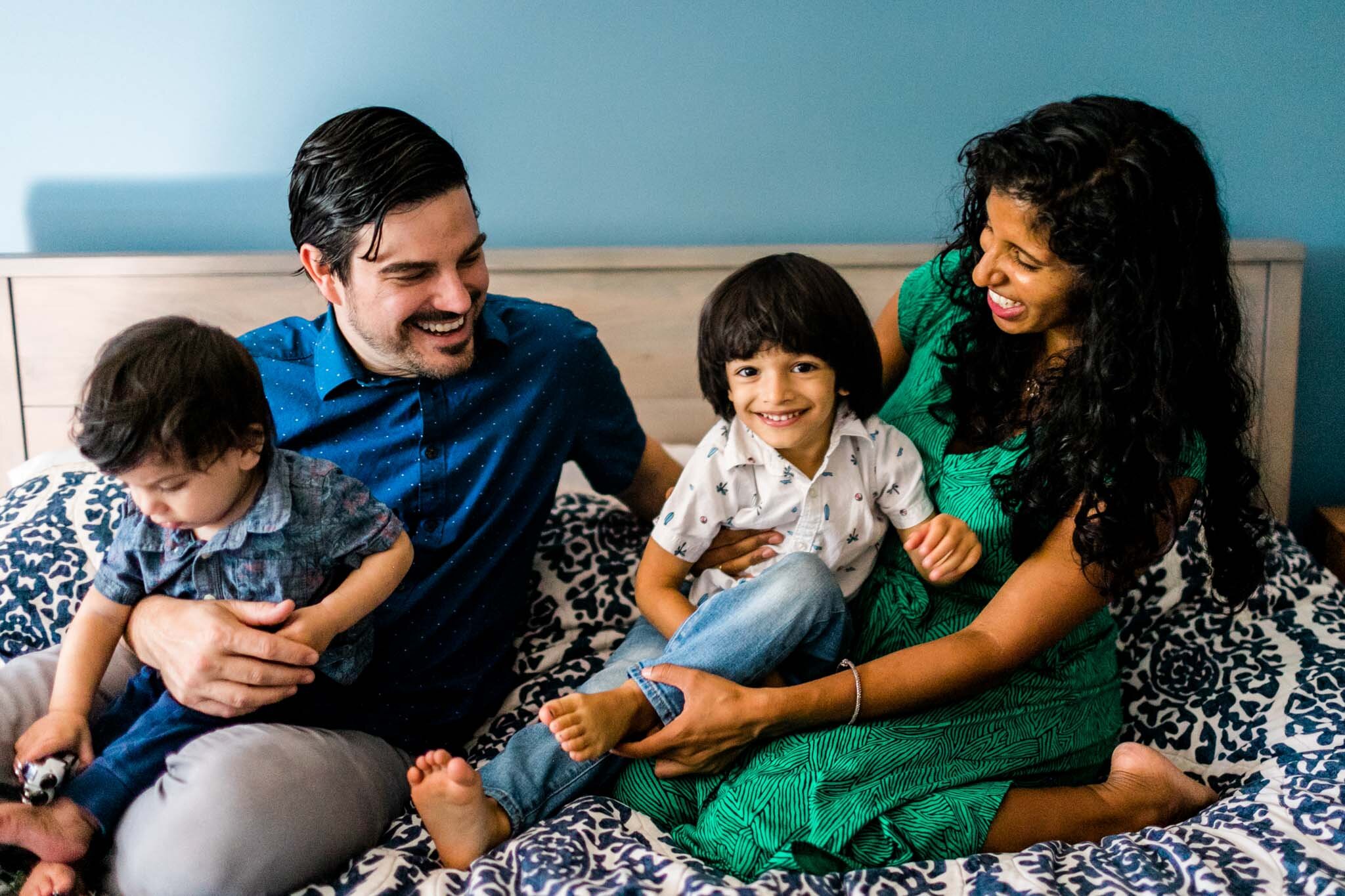 Durham Family Photographer | By G. Lin Photography | Family sitting together on bed | Lifestyle session at home