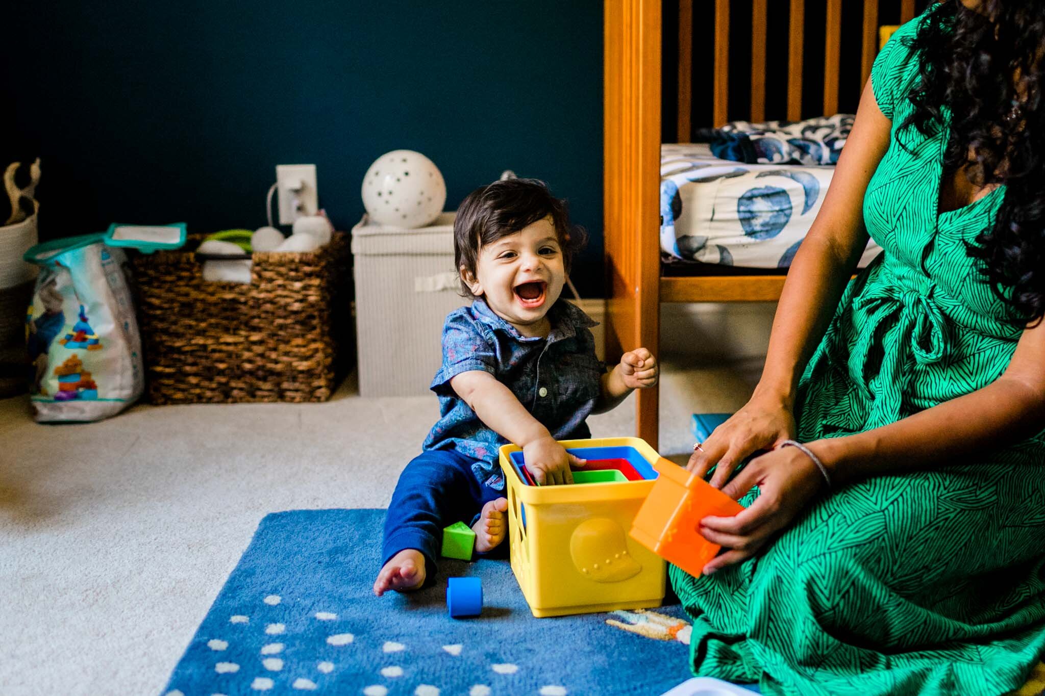 Durham Family Photographer | By G. Lin Photography | Toddler laughing with toys