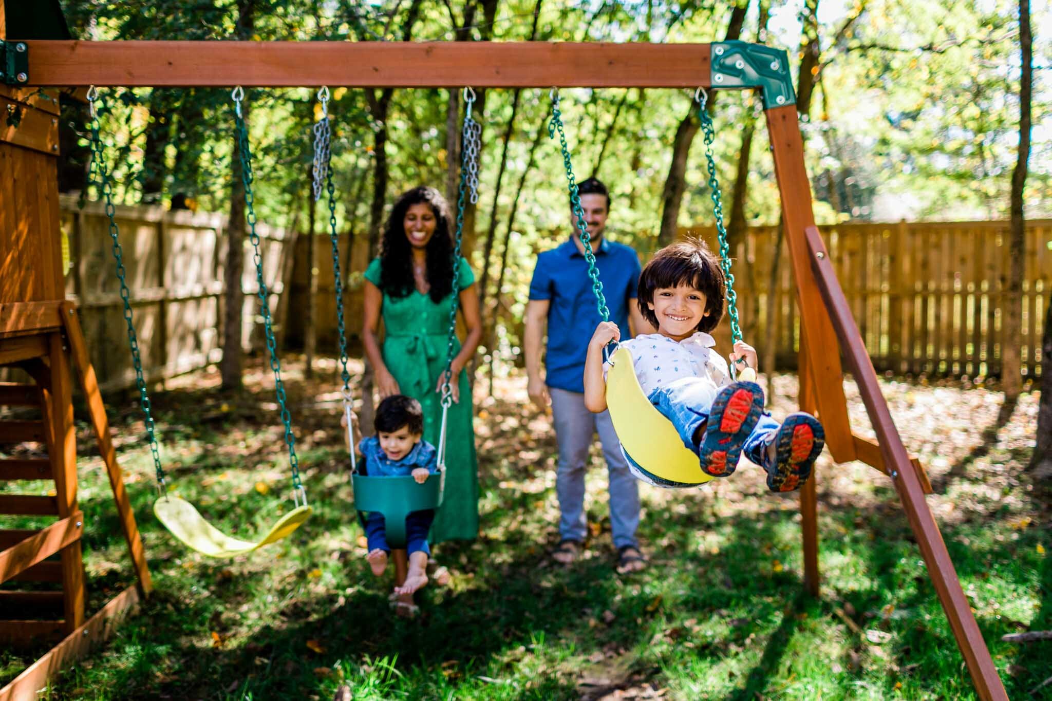 Durham Family Photographer | By G. Lin Photography | Kids playing on the swings