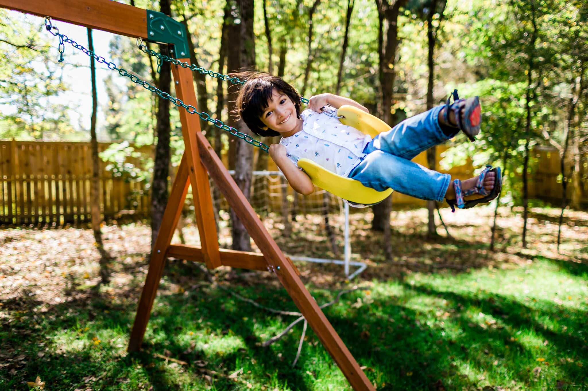 Durham Family Photographer | By G. Lin Photography | Lifestyle family photography of boy swinging