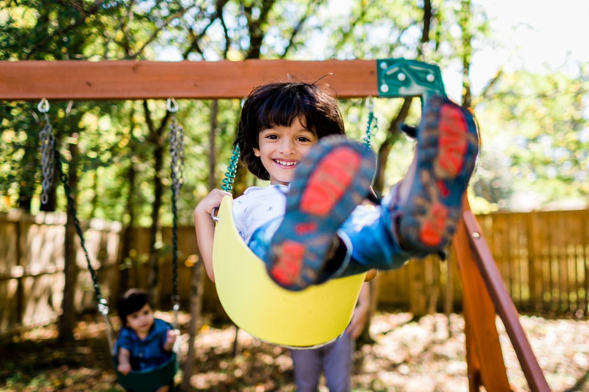 Durham Family Photographer | By G. Lin Photography | Lifestyle family photography | Young boy on swing